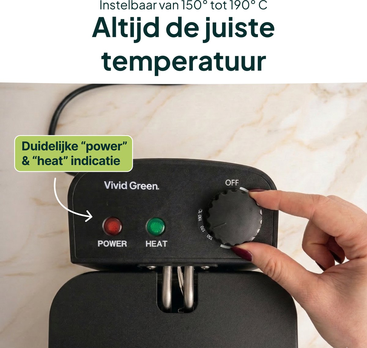 A hand turns a temperature dial on a black appliance with red and green indicator lights.