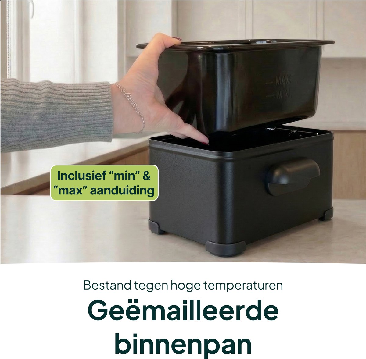 A hand lifts a black enamel insert with min/max markings.