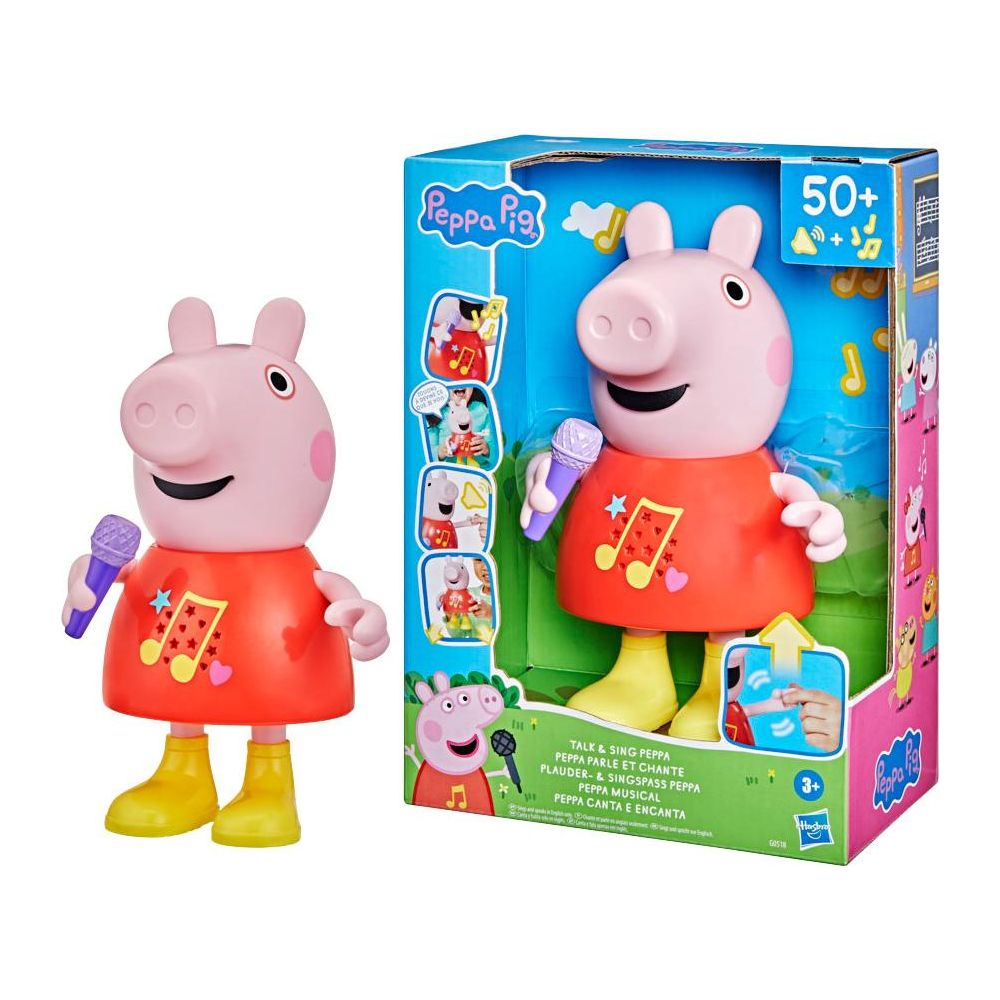 Peppa Wutz Spielzeug mit Mikrofon und rotem Kleid, in einer Box.