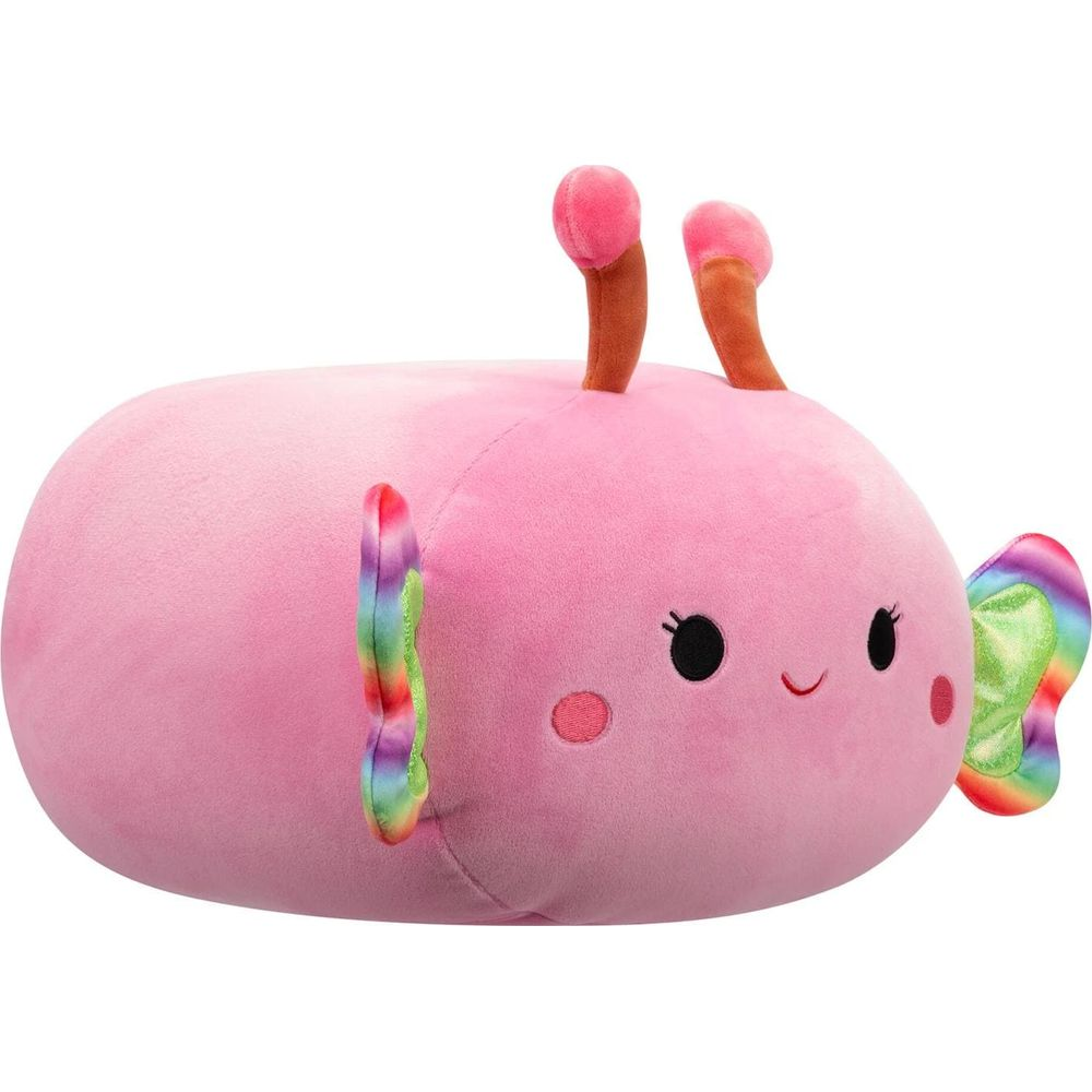 Une peluche rose en forme de papillon avec des ailes et des antennes arc-en-ciel.