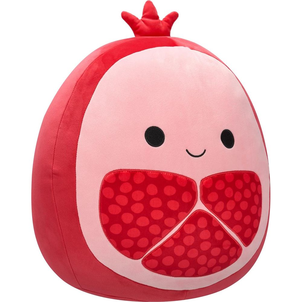 Une grenade en peluche rouge avec un visage souriant et une couronne.