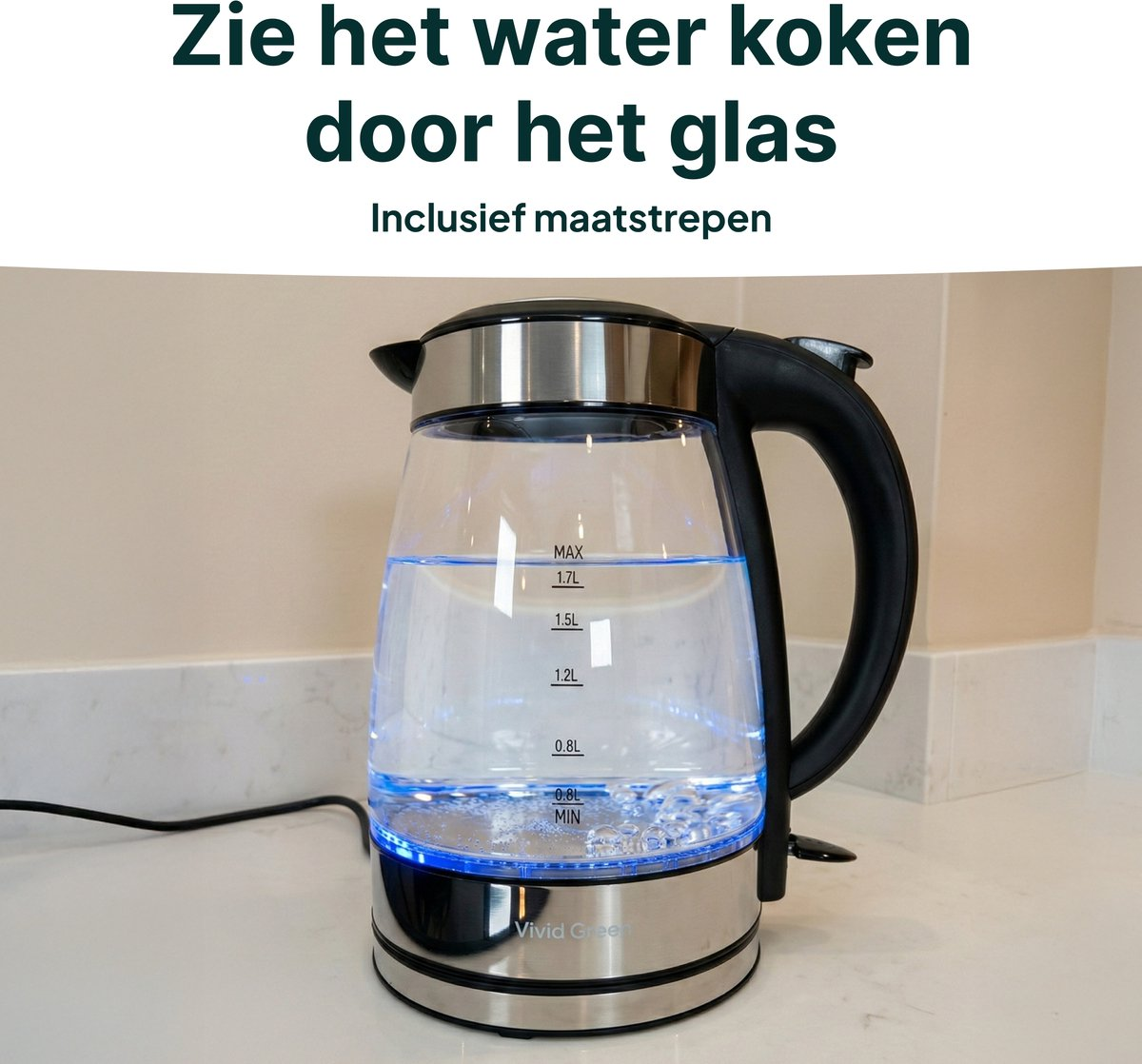 A glass kettle with blue light boils water with bubbles.