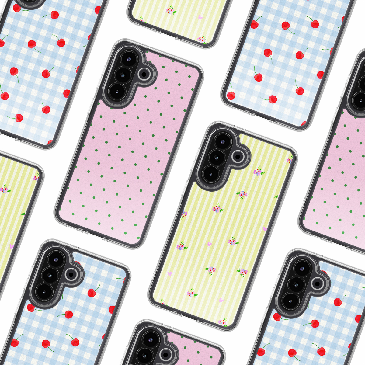 Diverse custodie per telefono con fantasie: ciliegie su quadretti blu, pois rosa, fiori su righe gialle.