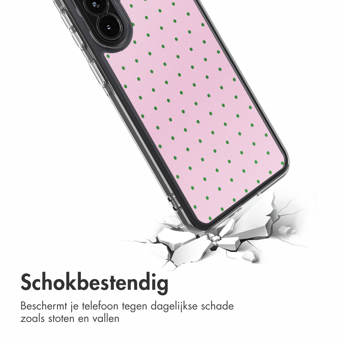 Una cover rosa per telefono con pois verdi cade e si rompe.