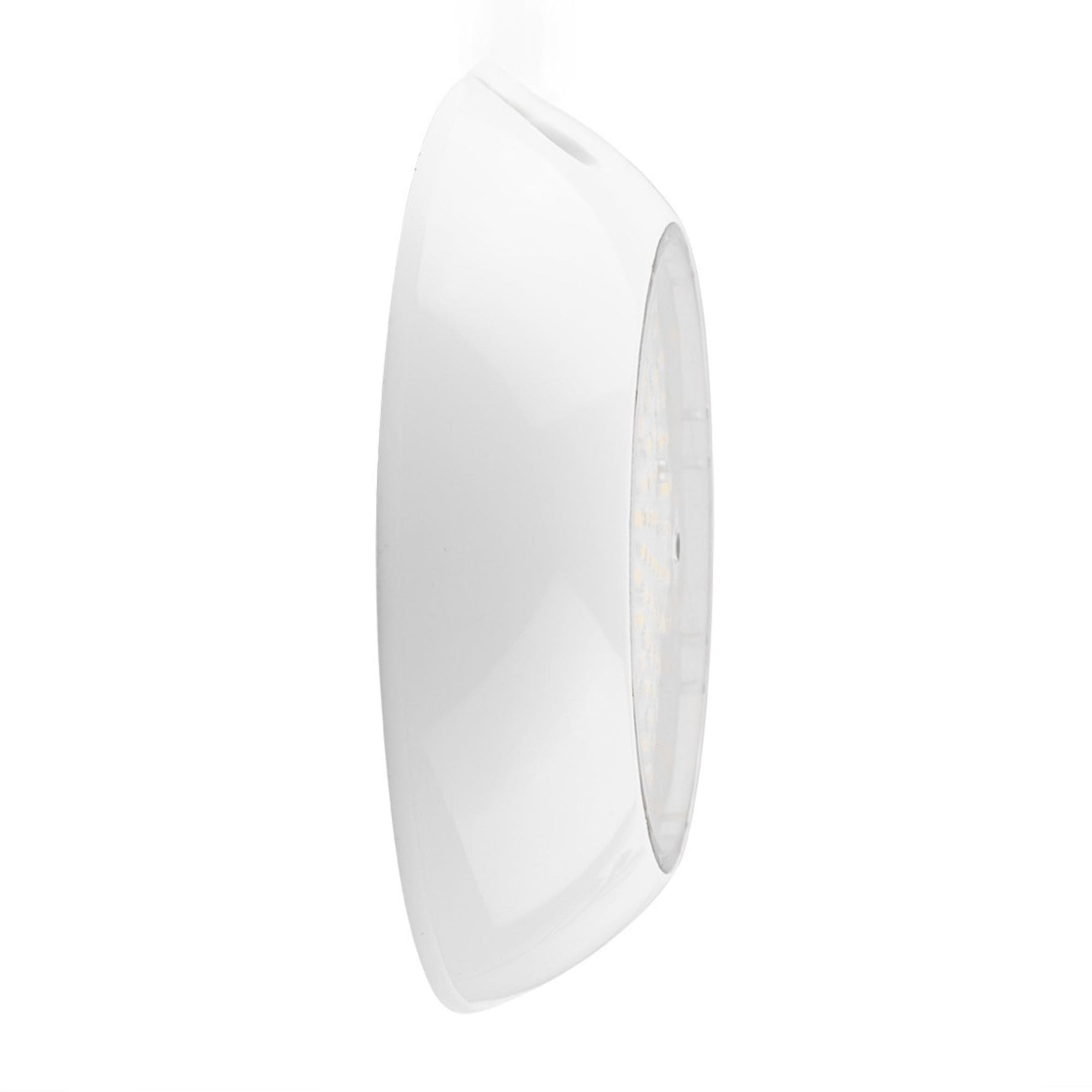 Una luz LED blanca y redonda con borde transparente.