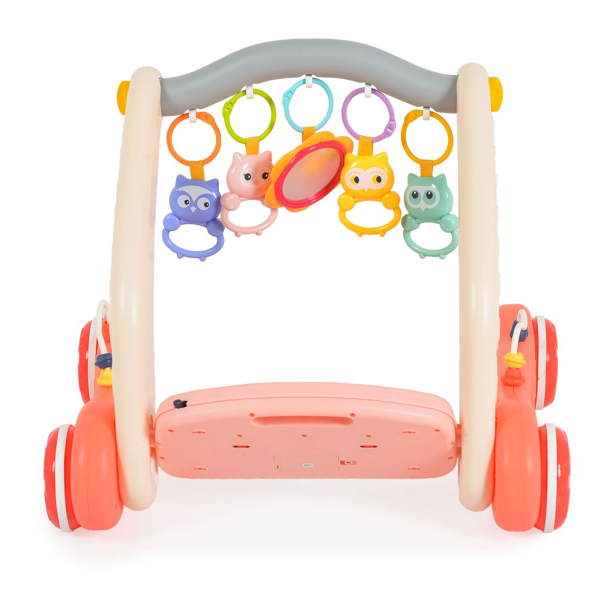 Ein rosafarbener Lauflernwagen mit Spielzeug-Eulen und einem Spiegel.