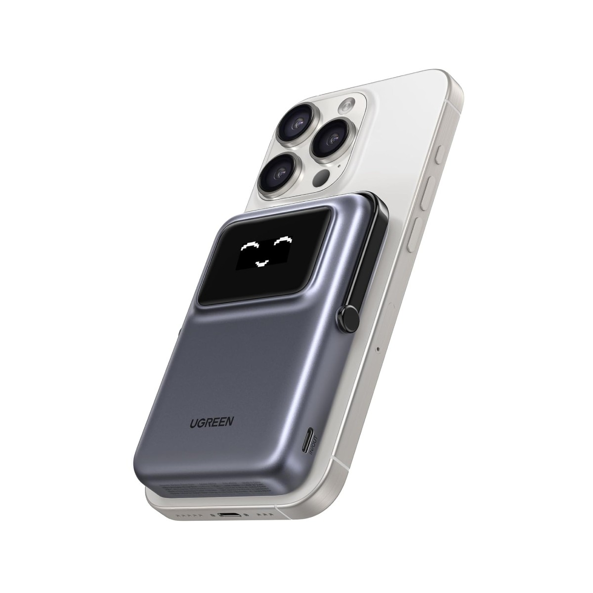 Szara obudowa z małym ekranem wyświetlającym twarz jest przymocowana do białego smartfona.