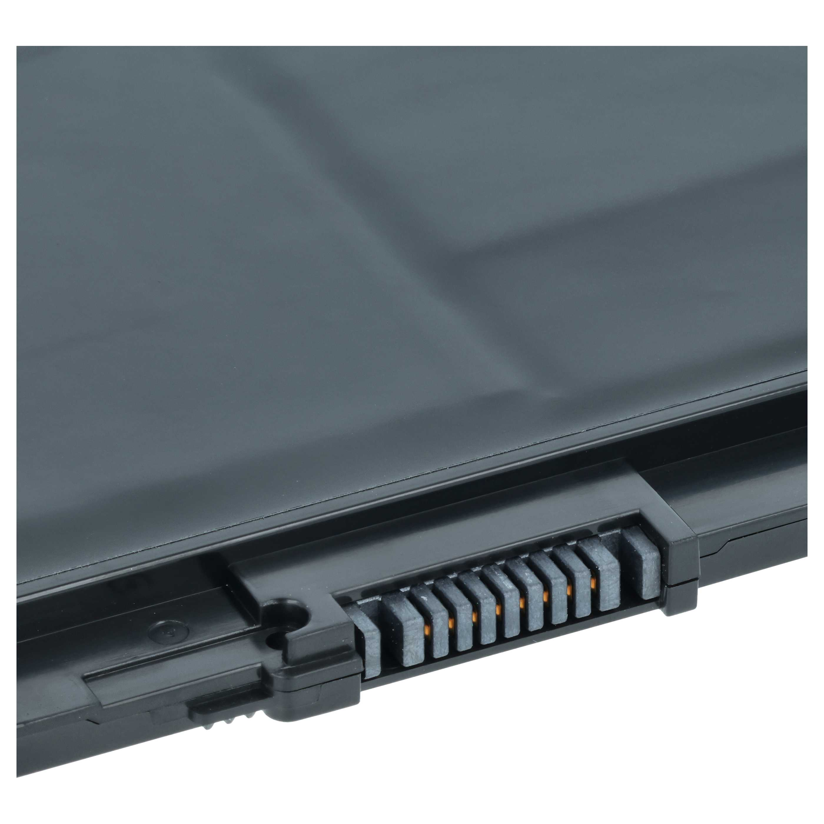 Nahaufnahme eines schwarzen Laptop-Akkus mit sichtbaren Anschlüssen.