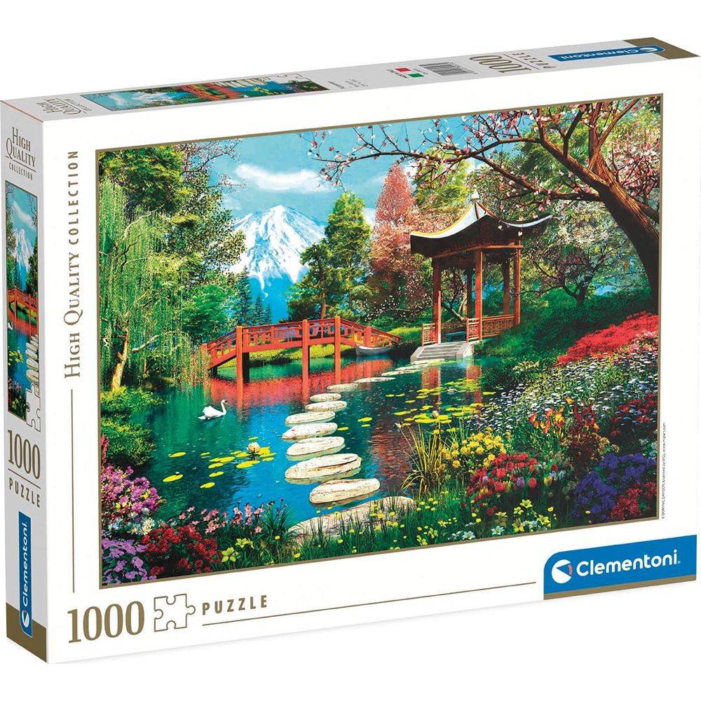 Jardín japonés con estanque, puente, pagoda, montaña y cisne.