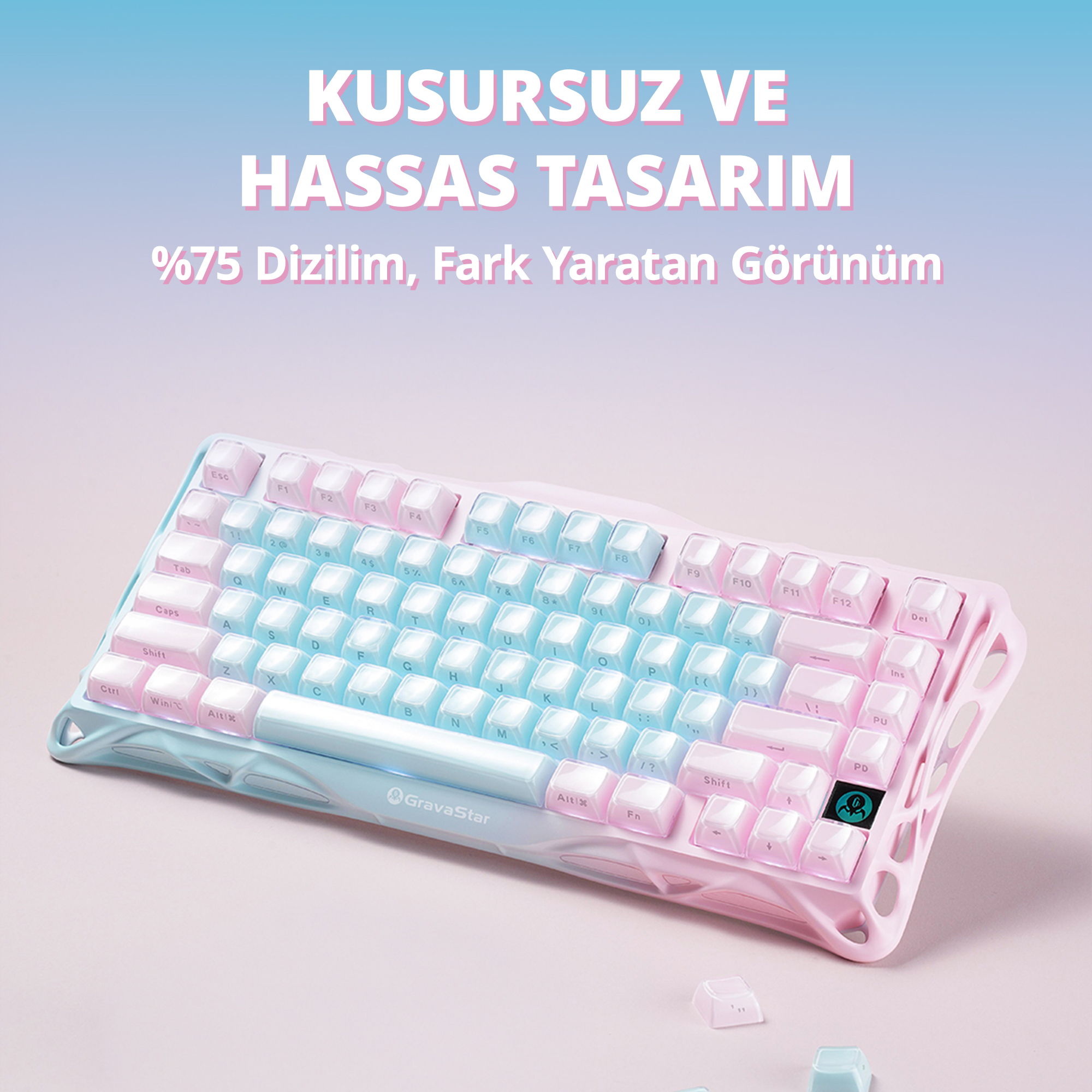 Różowa i jasnoniebieska klawiatura gamingowa z przezroczystymi klawiszami.