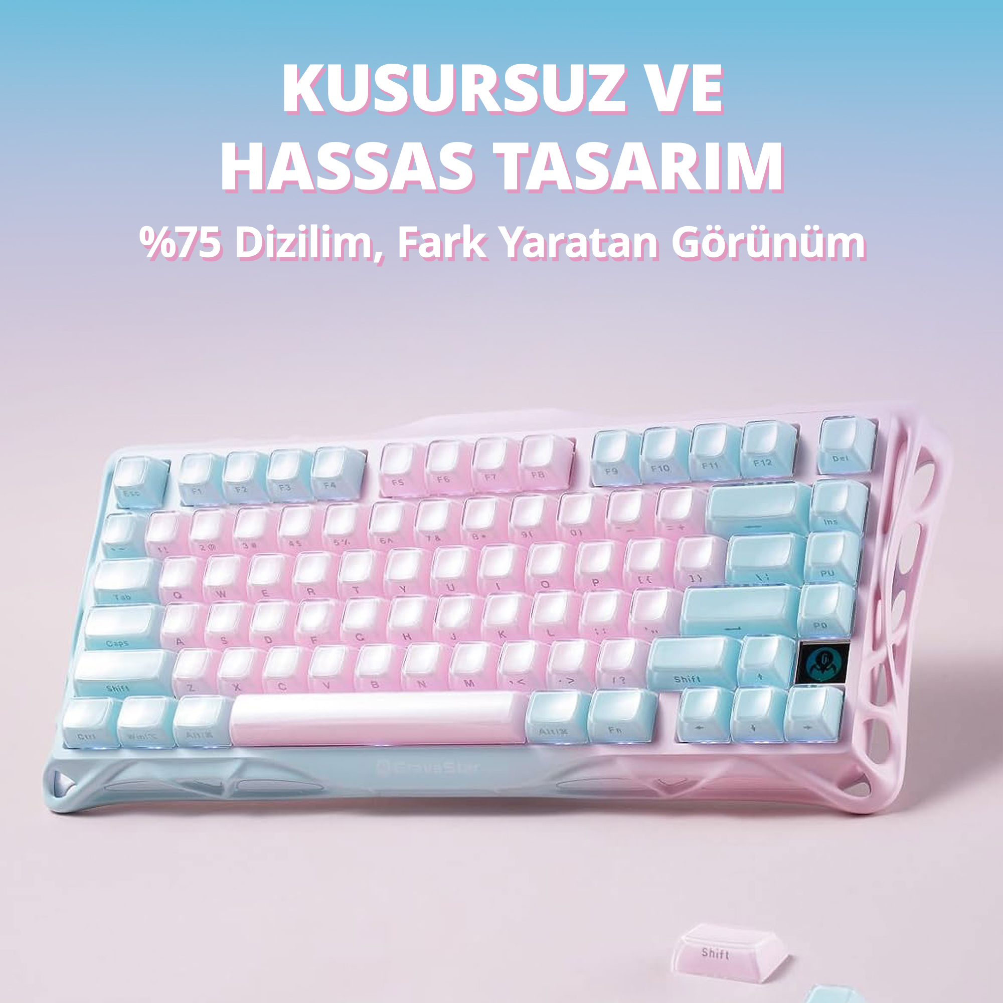 Klawiatura w pastelowych kolorach z różowymi i niebieskimi klawiszami.