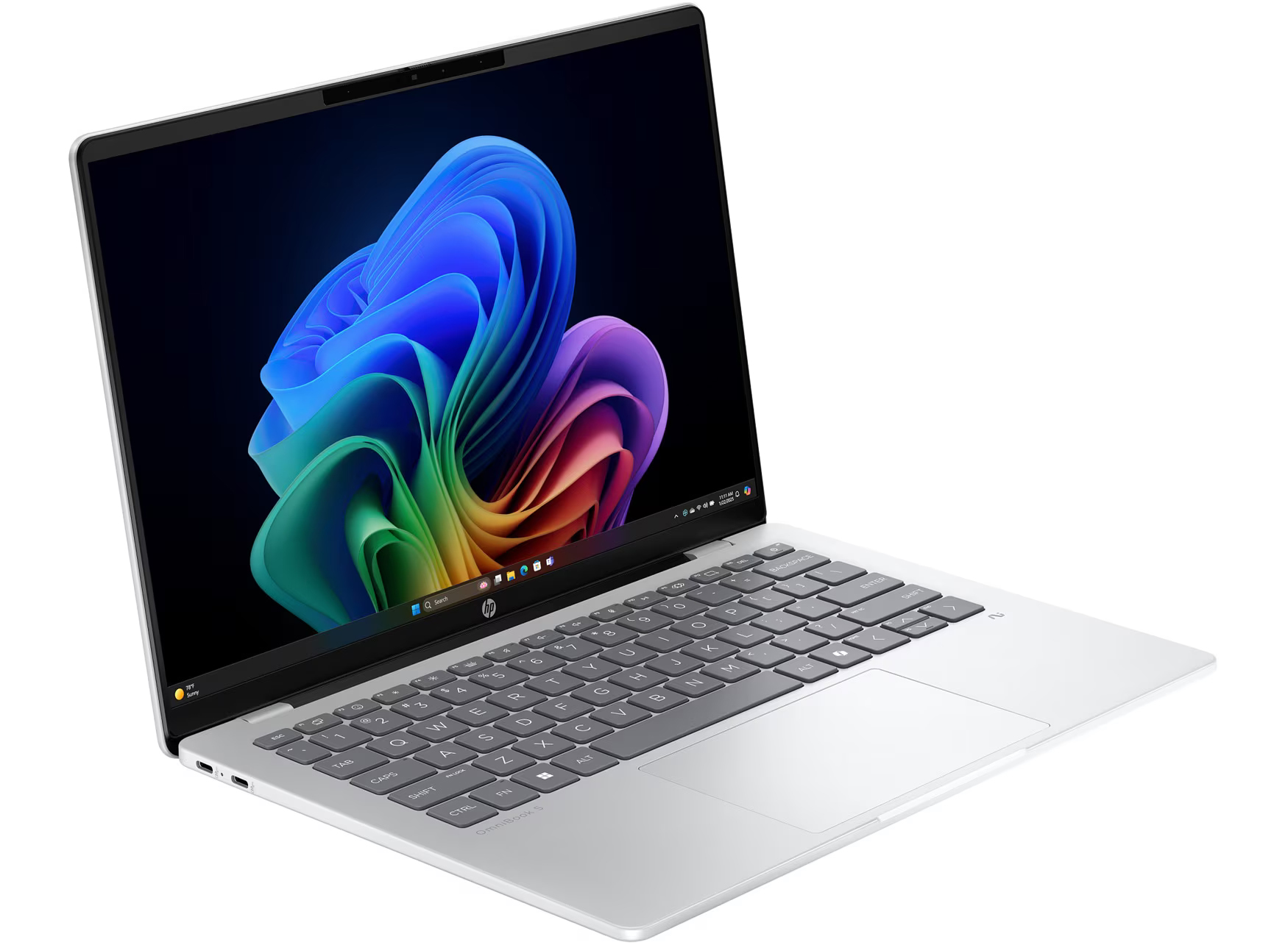 Ein silberner Laptop mit einem bunten Hintergrundbild auf dem Bildschirm.