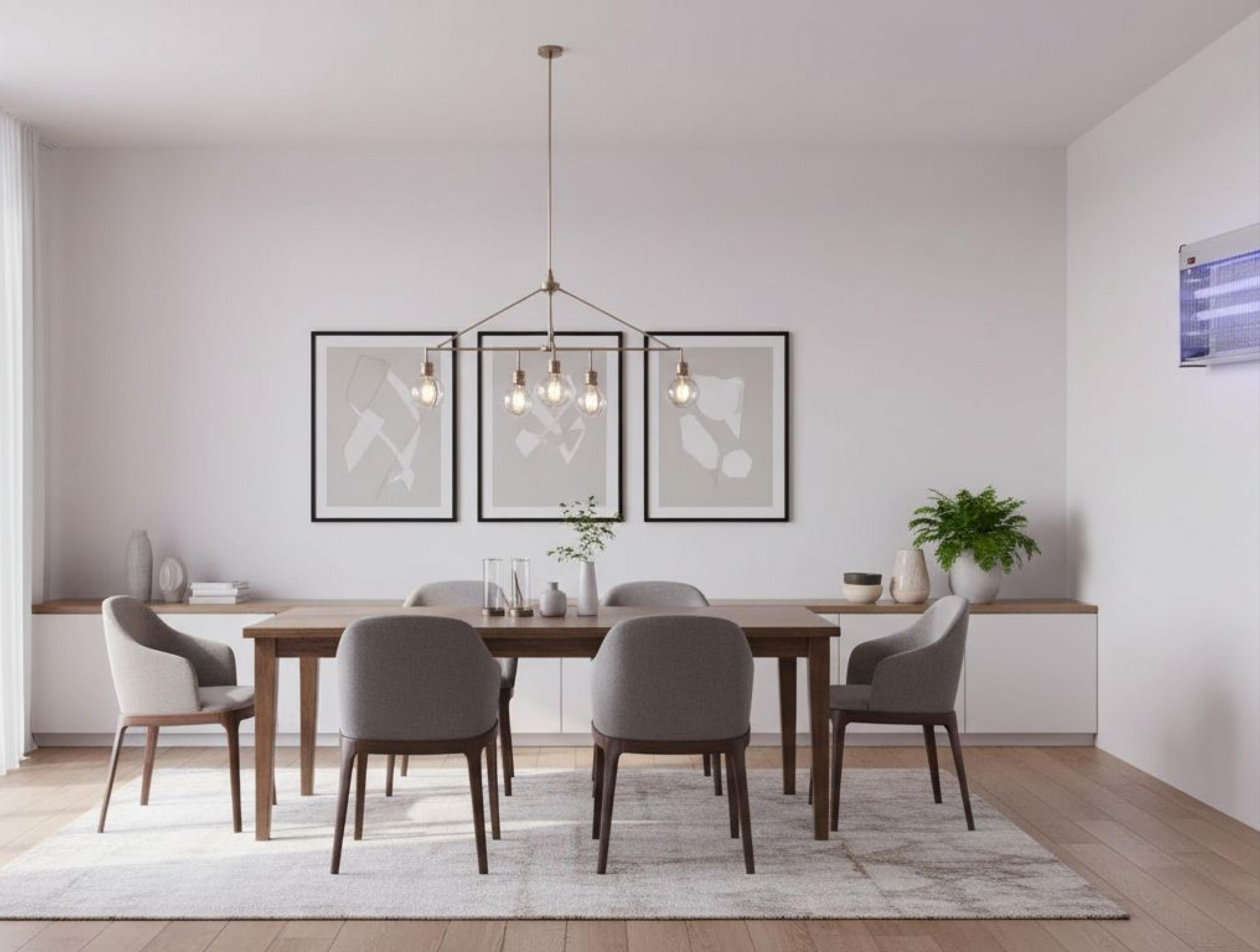 Un comedor con mesa, sillas, cuadros y un matainsectos.