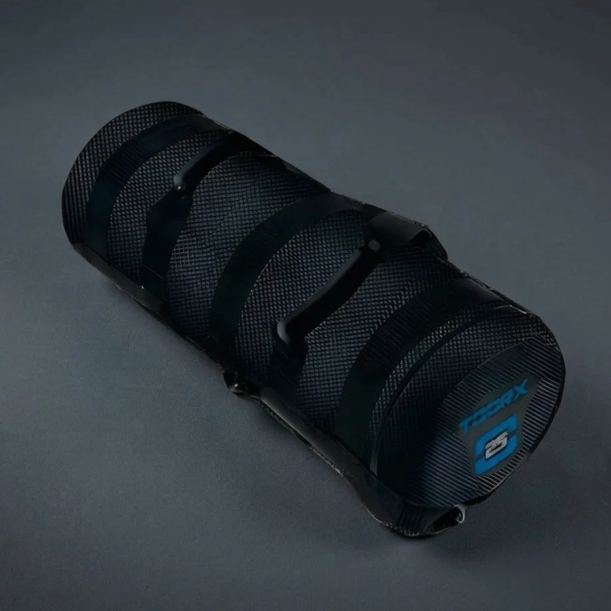 Black cylindrical object with blue accents and textured surface.