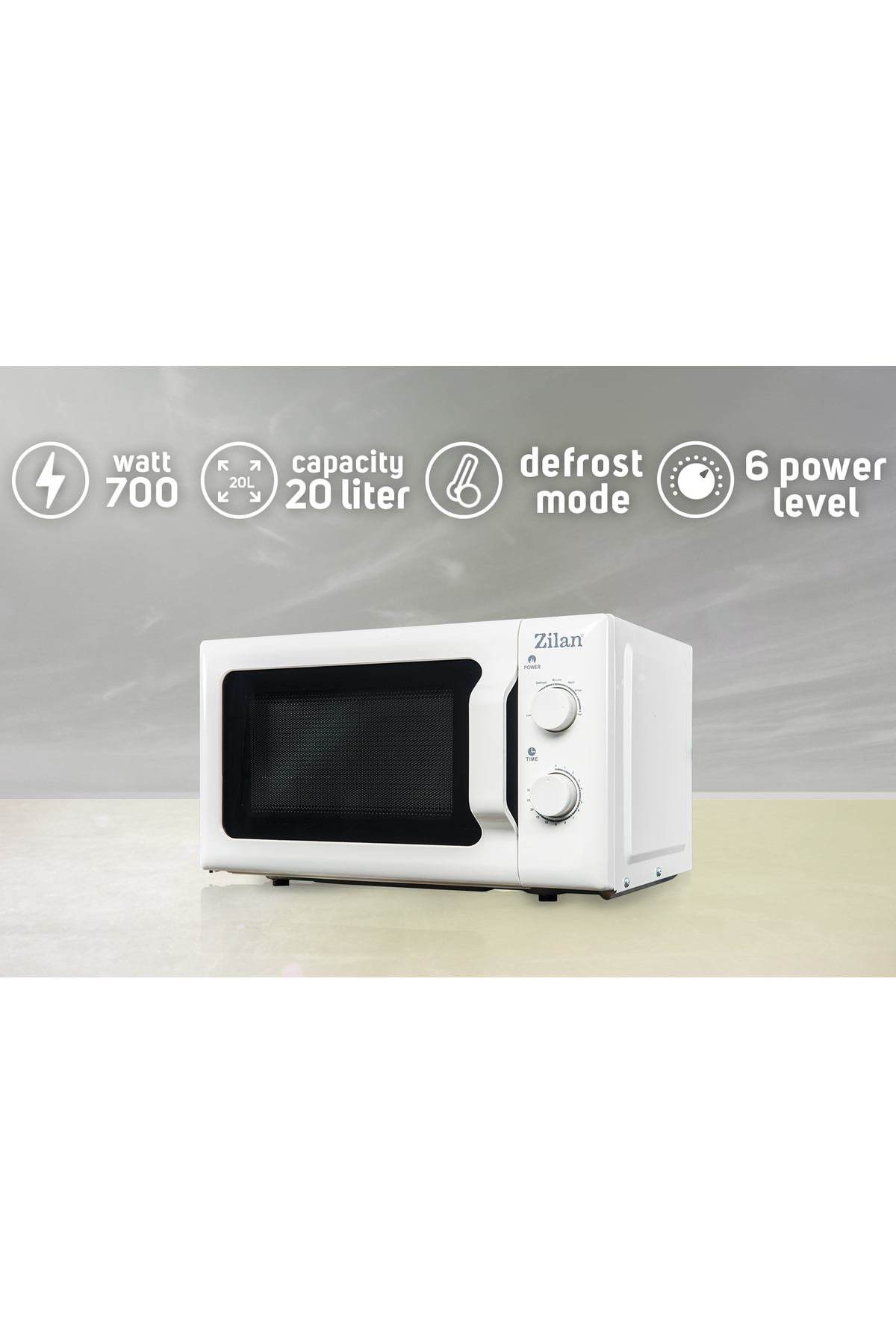 700W gücünde ve 20L kapasiteli beyaz bir Zilan mikrodalga fırın.