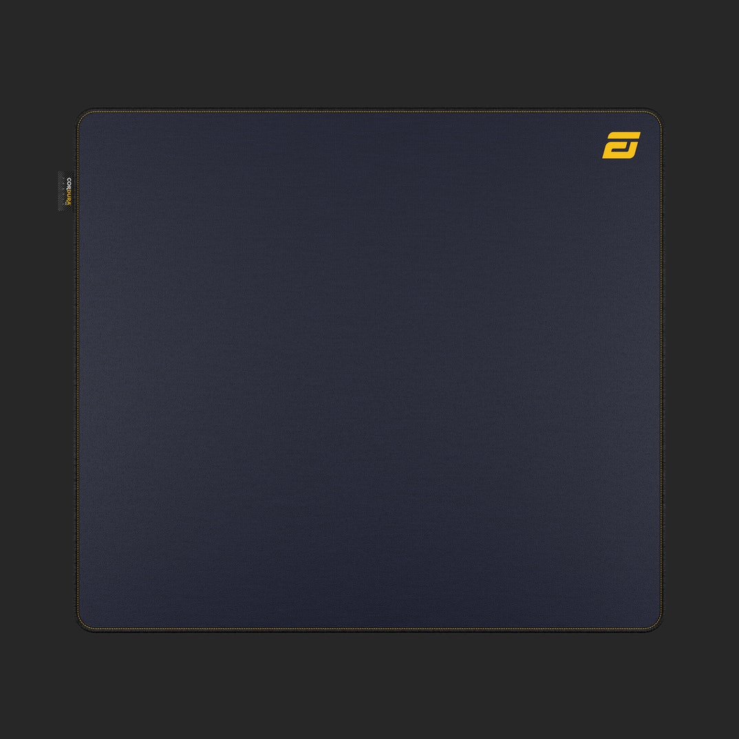 Dark blue mousepad with yellow logo top right and CORDURA text left.