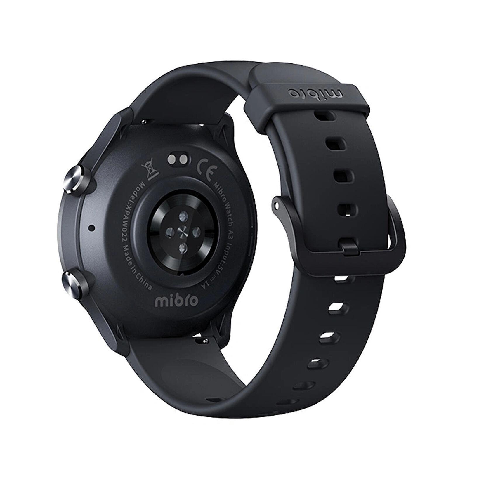Retro di uno smartwatch nero con contatti di ricarica e dettagli.