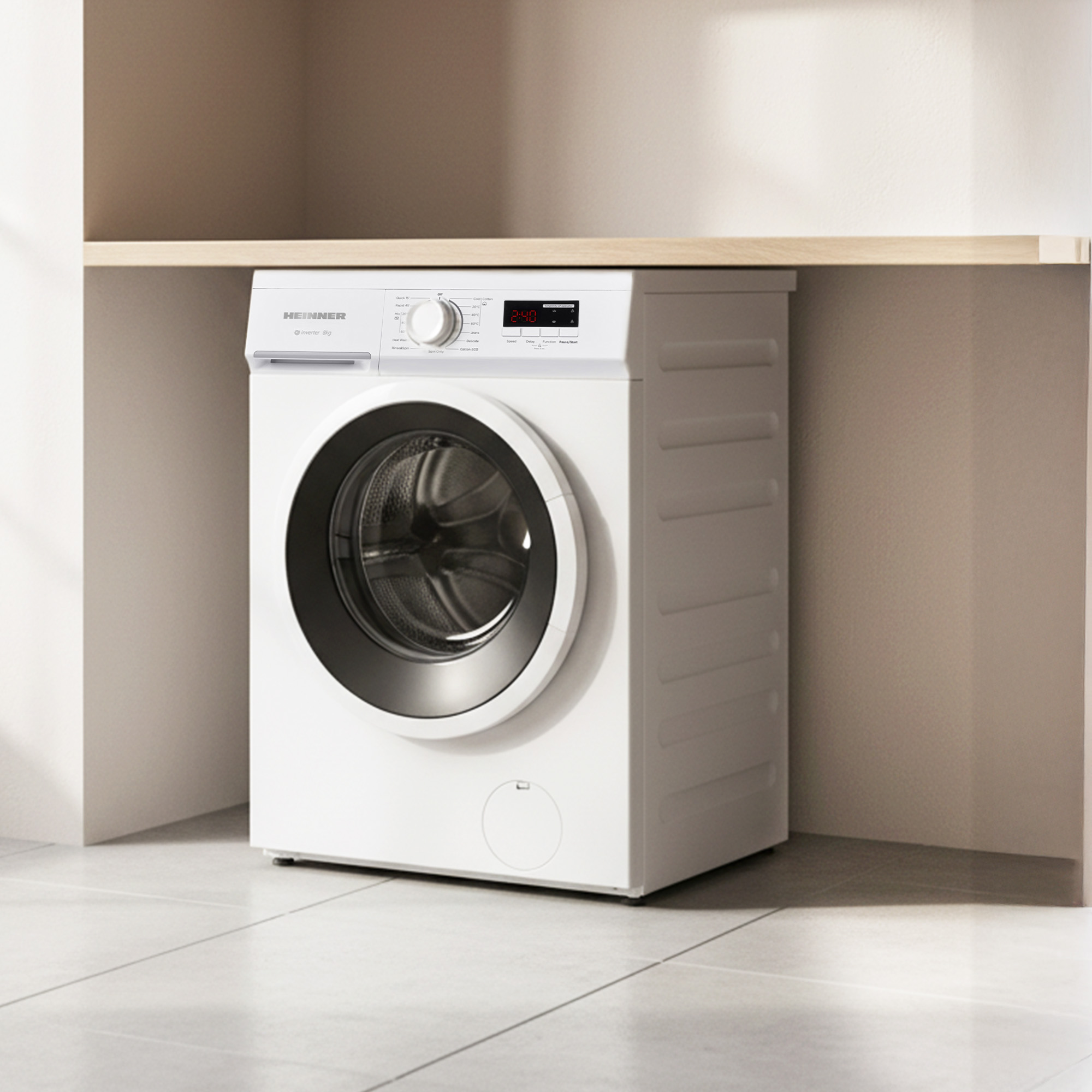 A white washing machine sits under a wooden shelf on a light tiled floor.