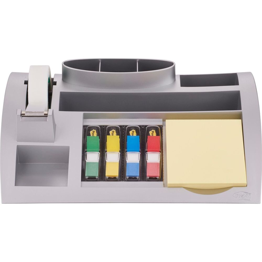 Un organizer da scrivania argentato con dispenser di nastro, foglietti adesivi e segnalibri Post-it.