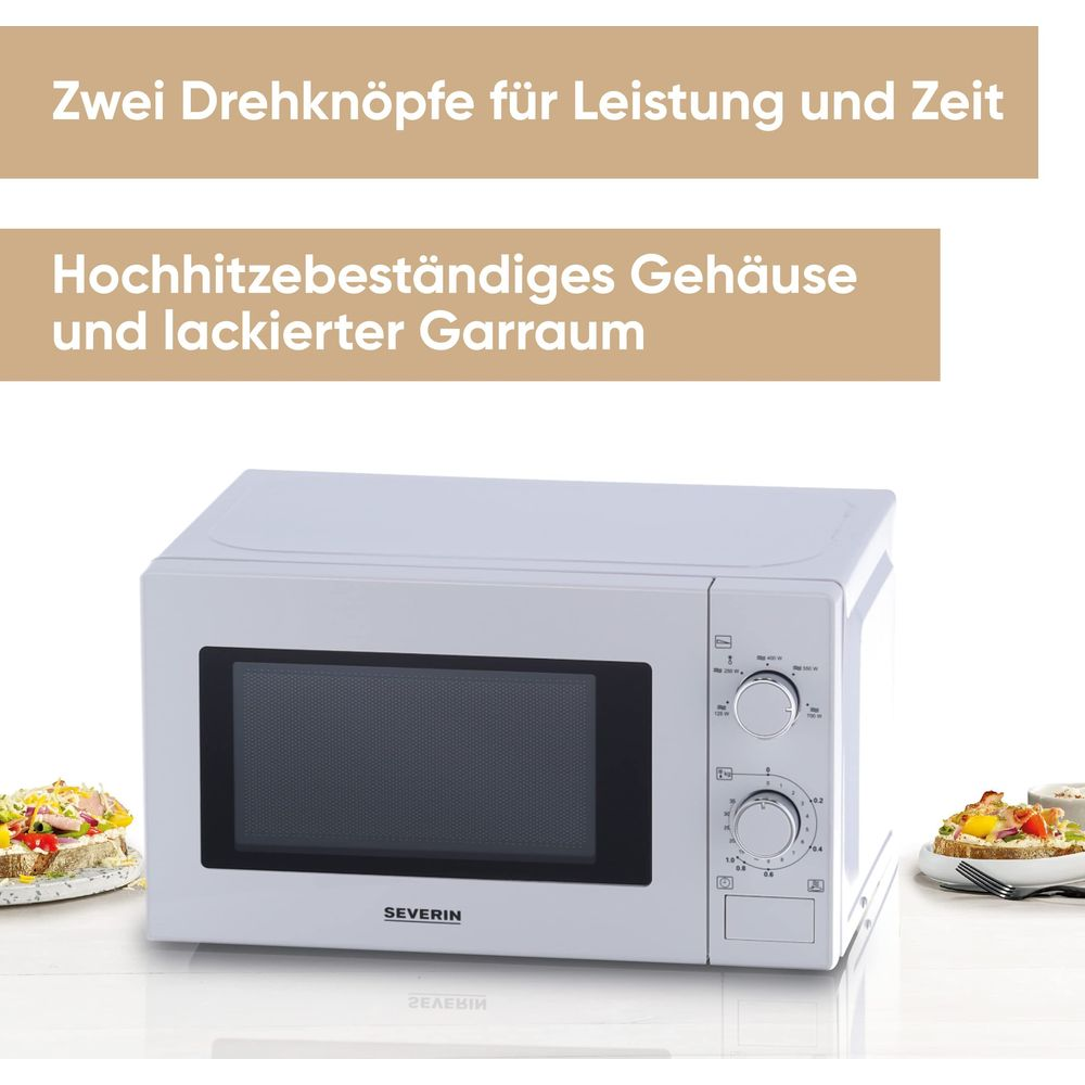 Biała kuchenka mikrofalowa z dwoma pokrętłami i oknem.