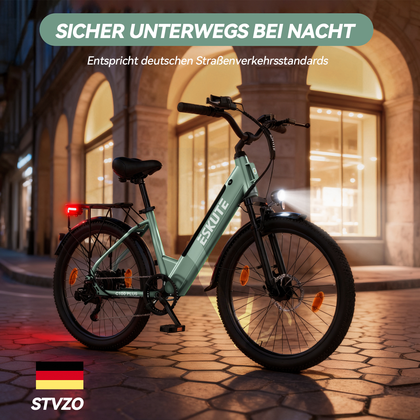 Grünes E-Bike im nächtlichen Straßenszenario mit Scheinwerfern und Rücklicht.