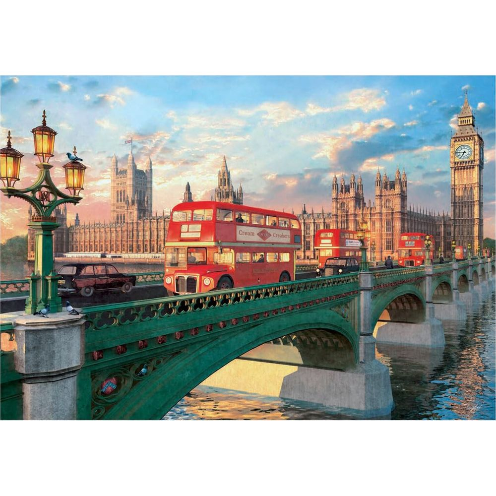 Bus rouges à impériale sur un pont avec le Parlement et Big Ben à Londres.