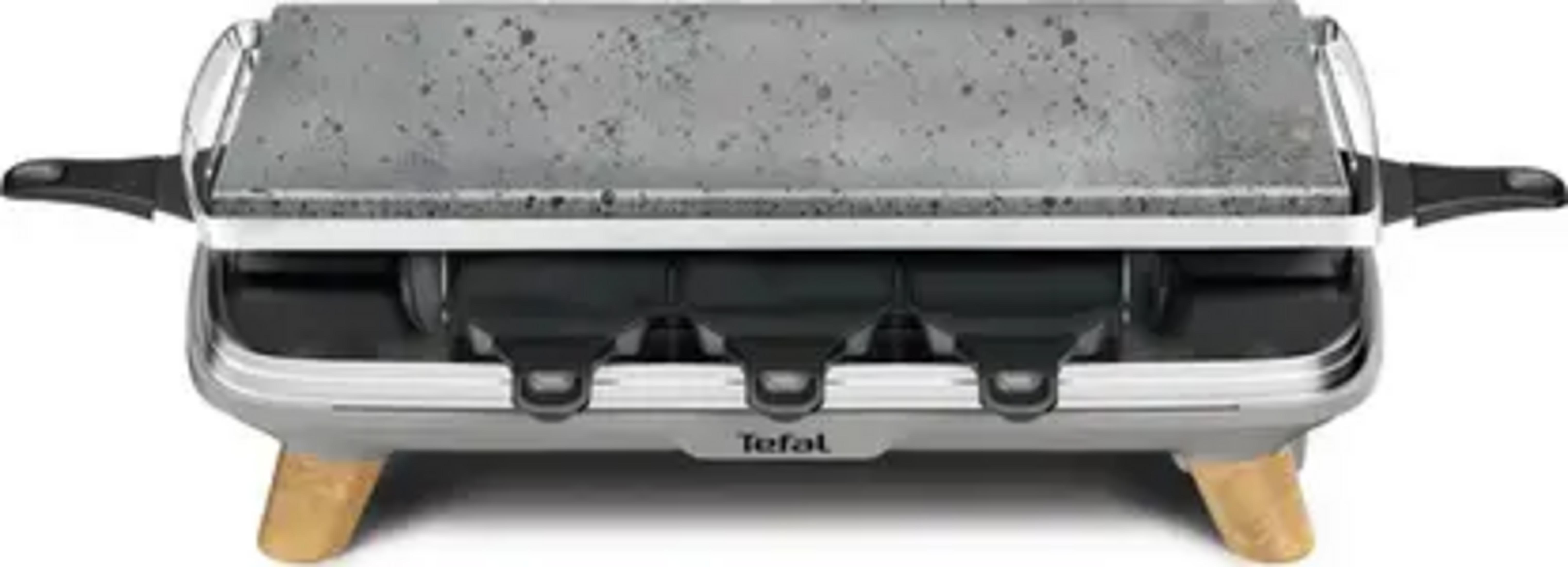 Ein Tefal Raclette-Grill mit Steinplatte, silbernem Gehäuse und Holzfüßen.