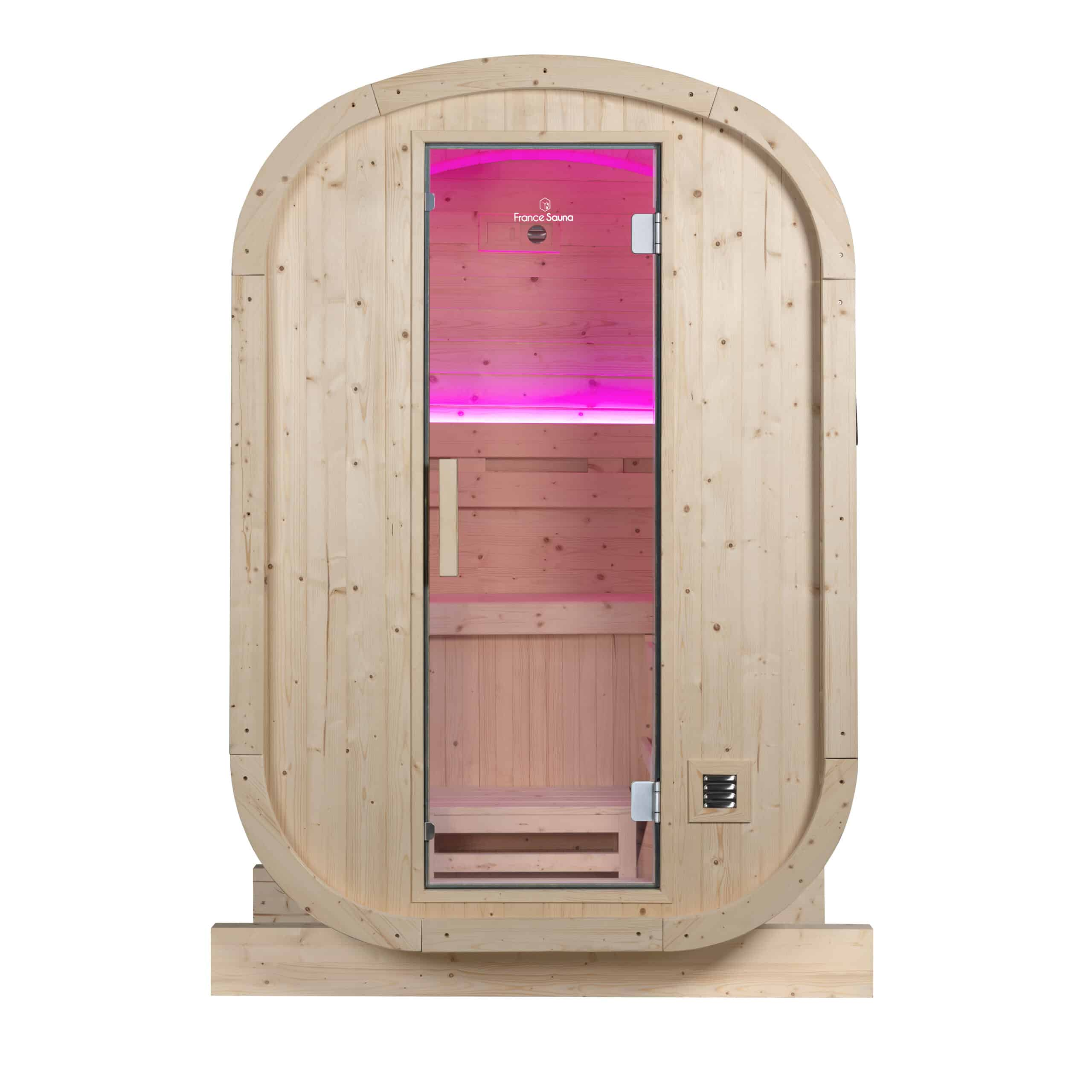 Sauna de madera con puerta de cristal e iluminación púrpura.