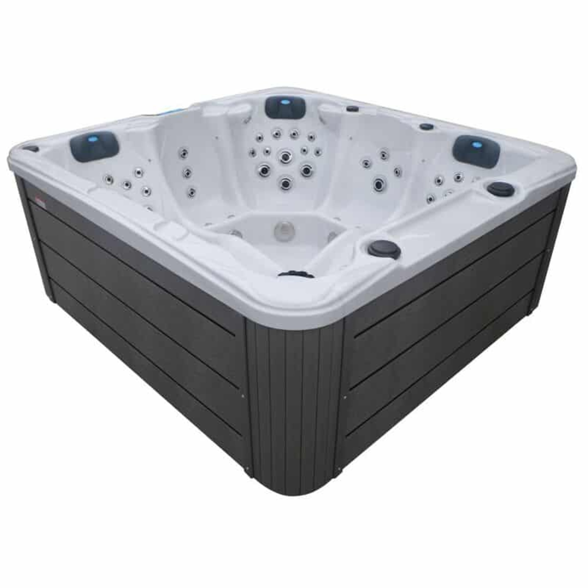 Un jacuzzi de esquina con interior blanco y revestimiento oscuro.