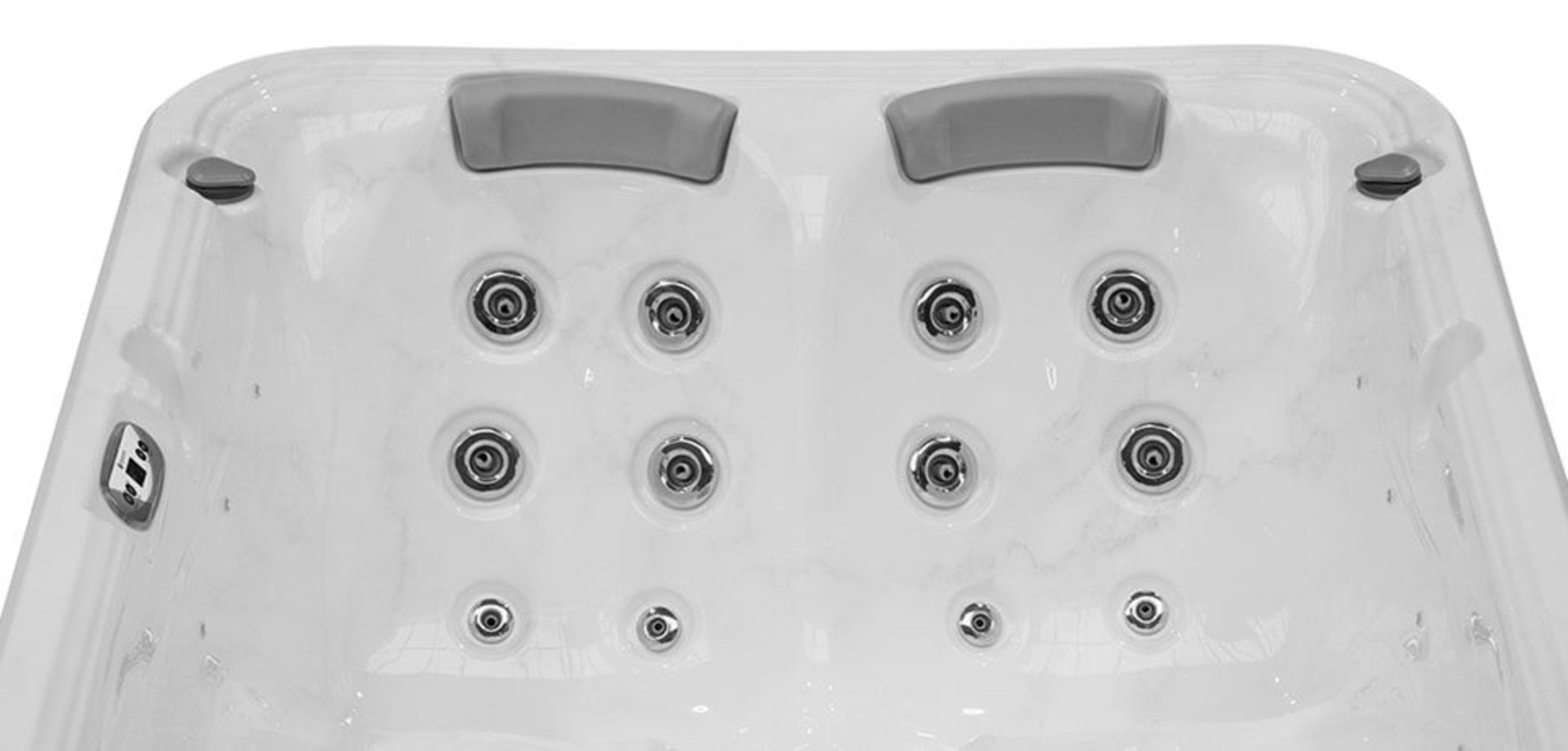 Un jacuzzi blanco con dos reposacabezas y varios chorros.