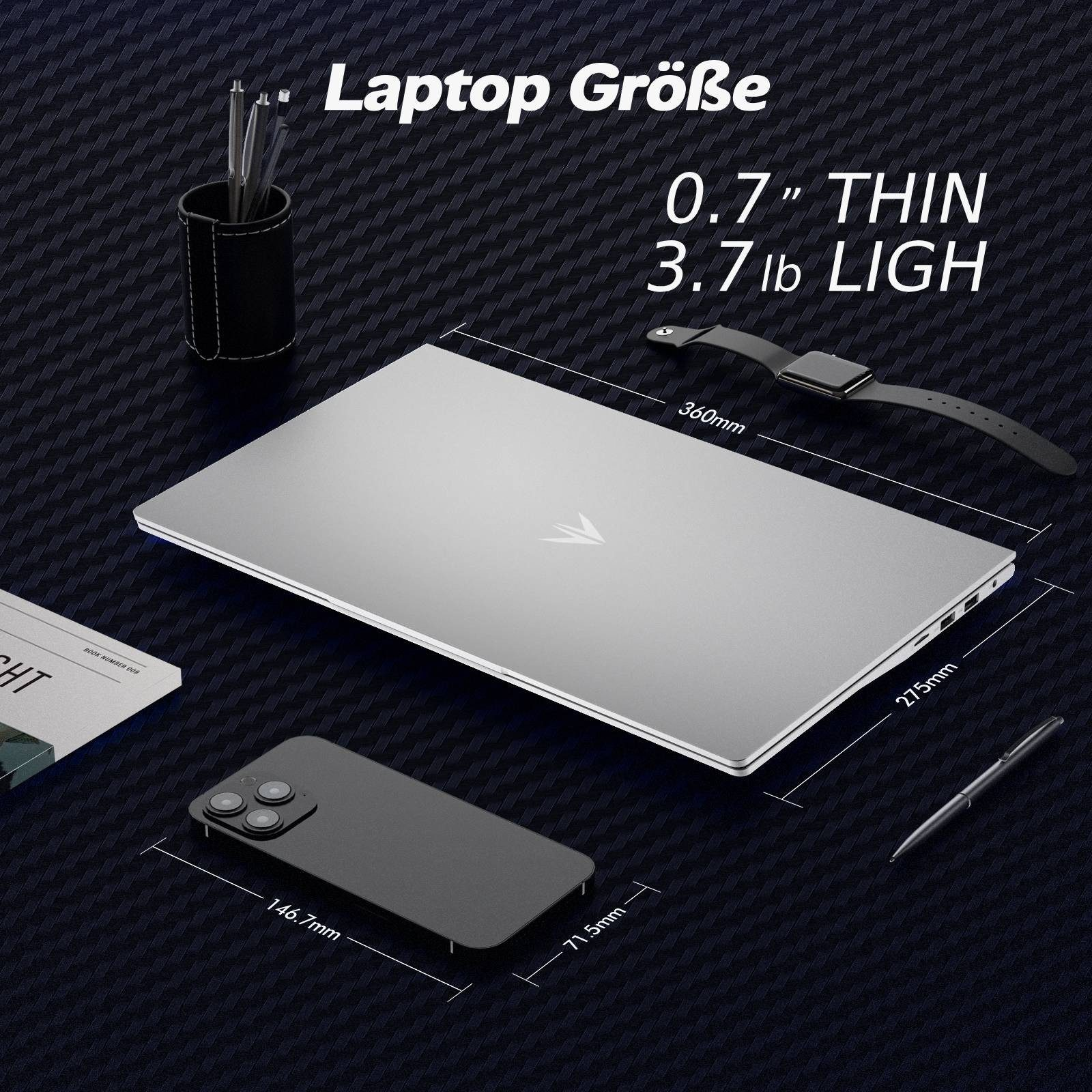 Ein silberner Laptop, ein Smartphone und Stifte auf dunklem Hintergrund.