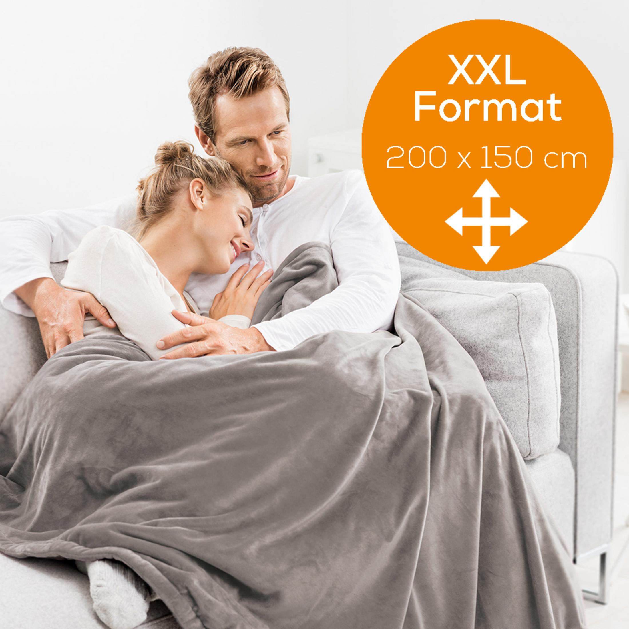 Man and woman cuddling under a gray blanket. XXL Format 200x150 cm.