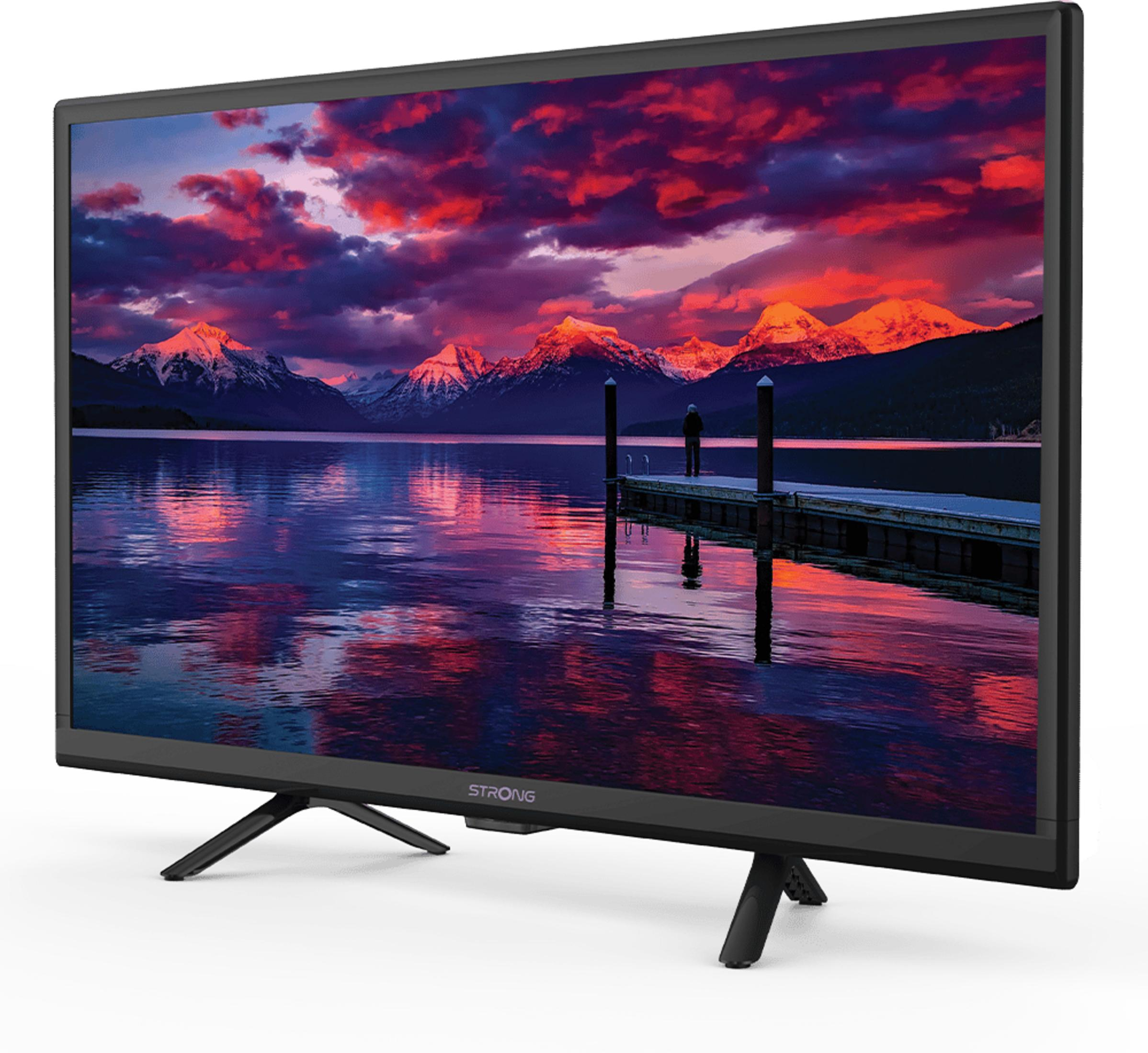 Telewizor wyświetla górski krajobraz o zachodzie słońca nad jeziorem.