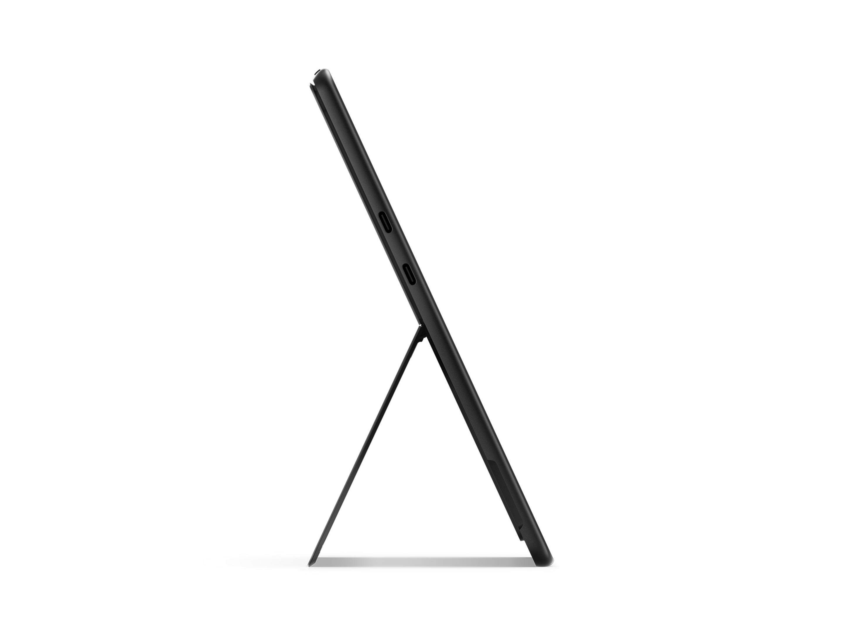 Czarny tablet z podpórką na białym tle.