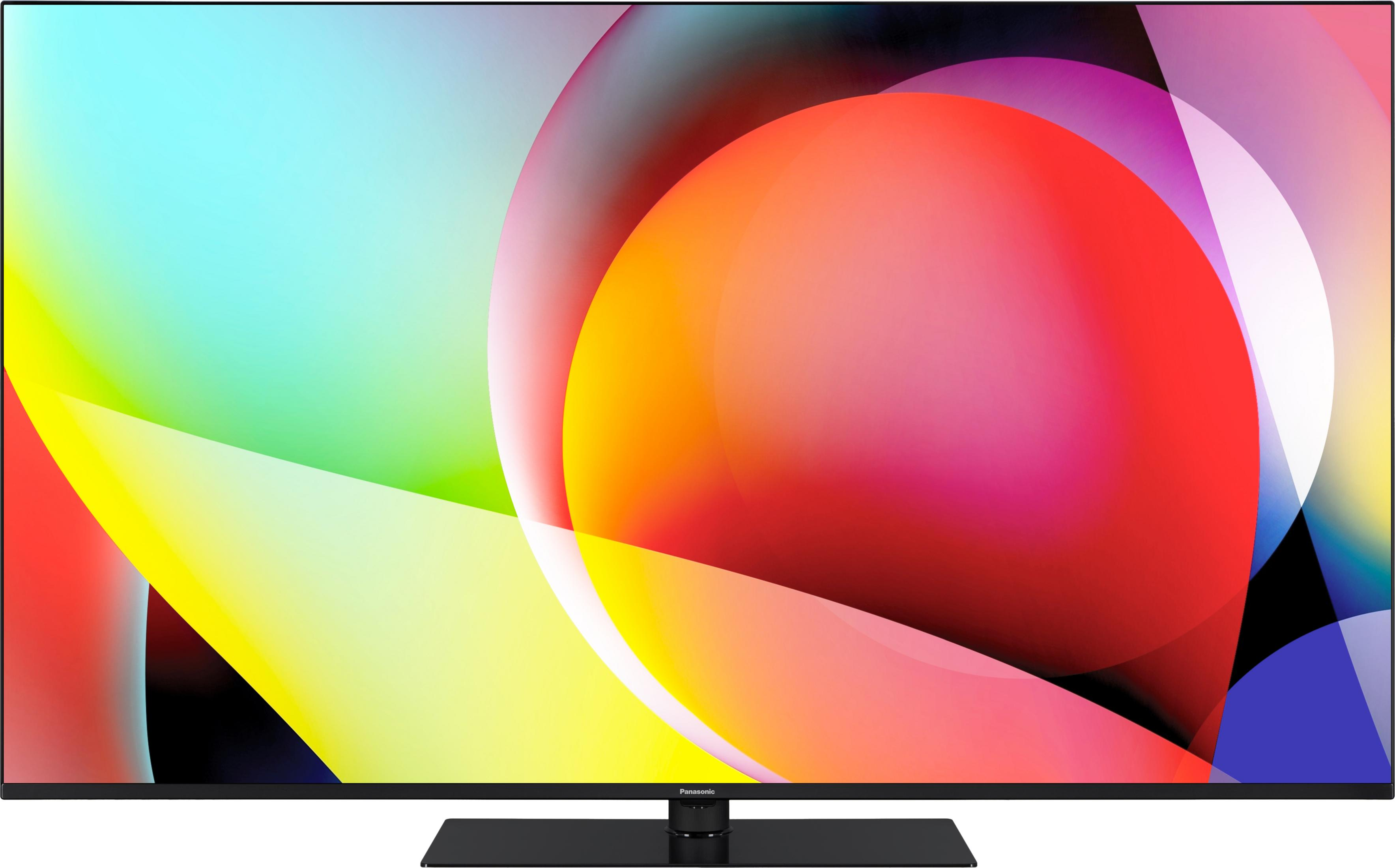 Un televisore moderno con uno sfondo astratto e colorato.