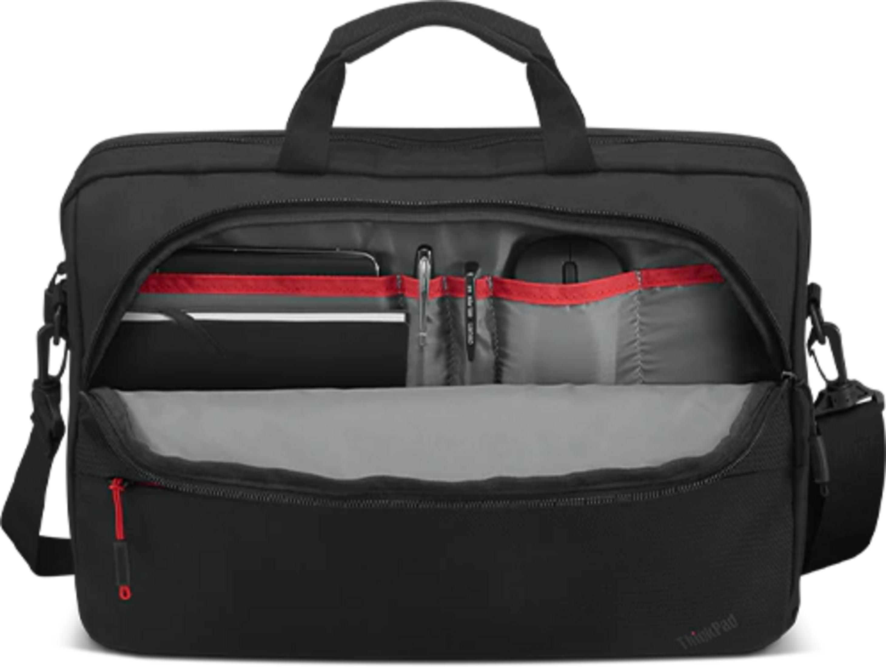 Black laptop bag with open main compartment. Contains laptop, mouse, and pens.