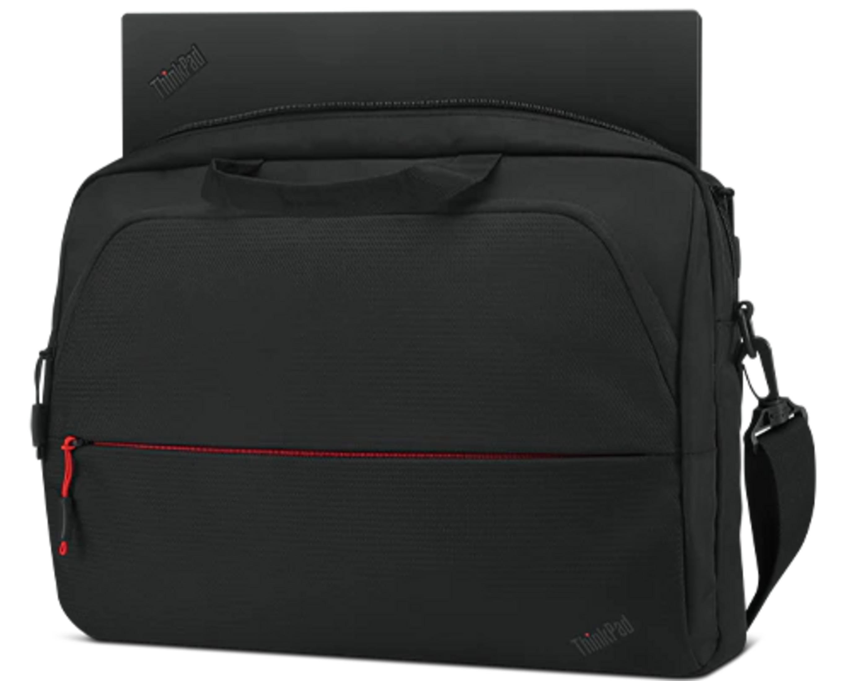 Black laptop bag with red zipper and laptop in background.