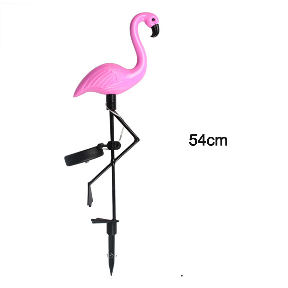 Eine rosa Flamingo-Gartenleuchte mit Solarpanel. Höhe 54cm.