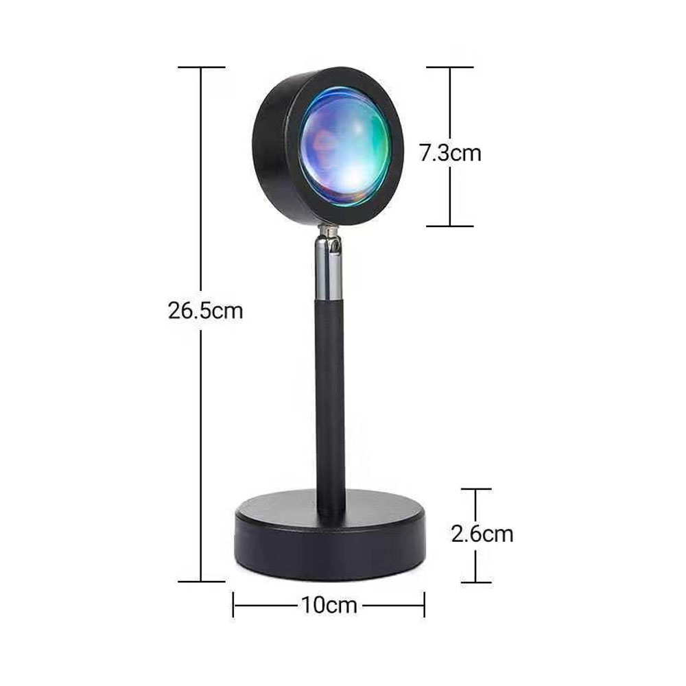 Eine schwarze Tischlampe mit einem runden Kopf, der ein buntes Licht ausstrahlt.