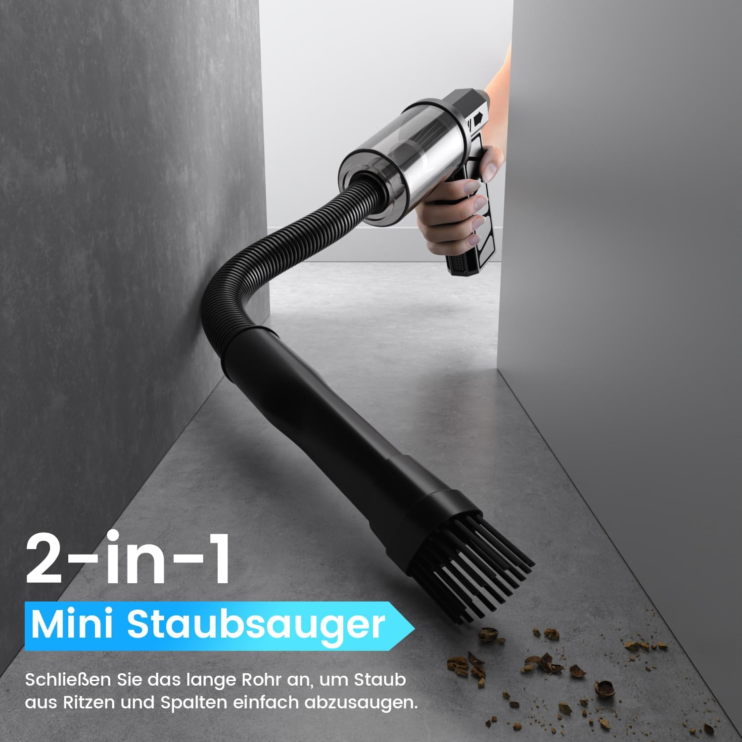 Ein Handgriff hält einen flexiblen Mini-Staubsauger, der Staub auf dem Boden aufsaugt.
