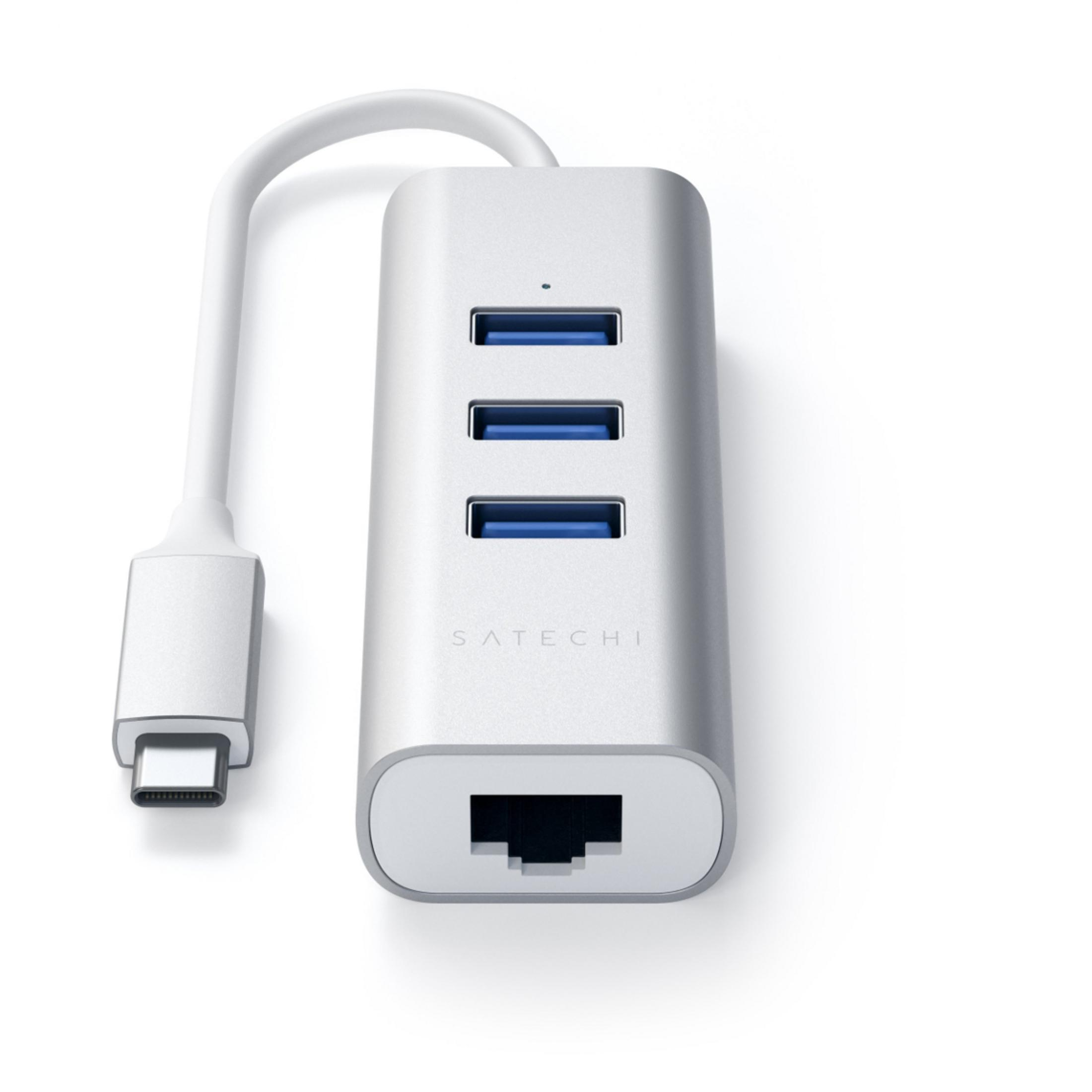 Hub USB-C argentato con tre porte USB-A e una porta Ethernet.