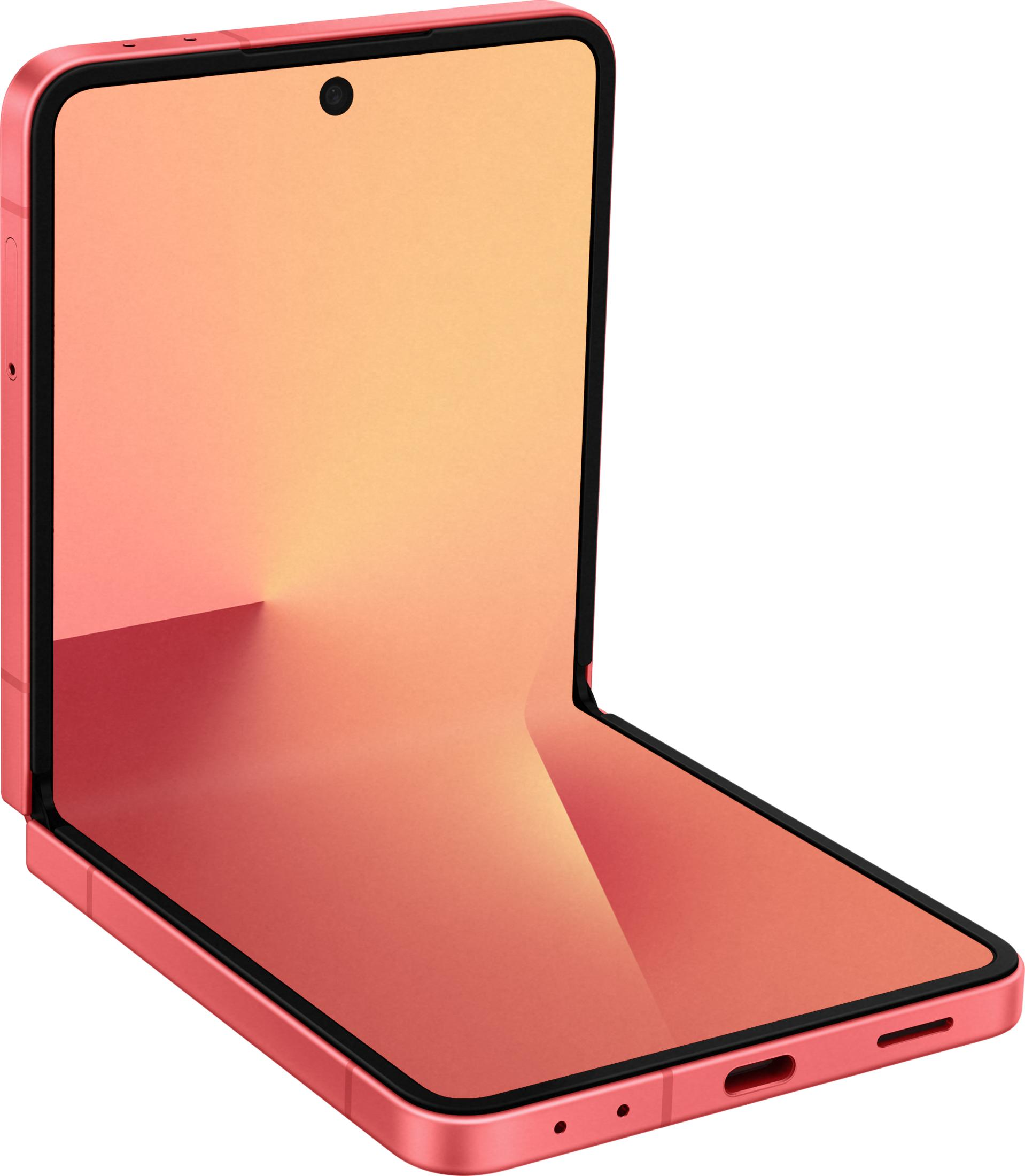 Un smartphone pliable rose, écran ouvert, posé sur une surface.