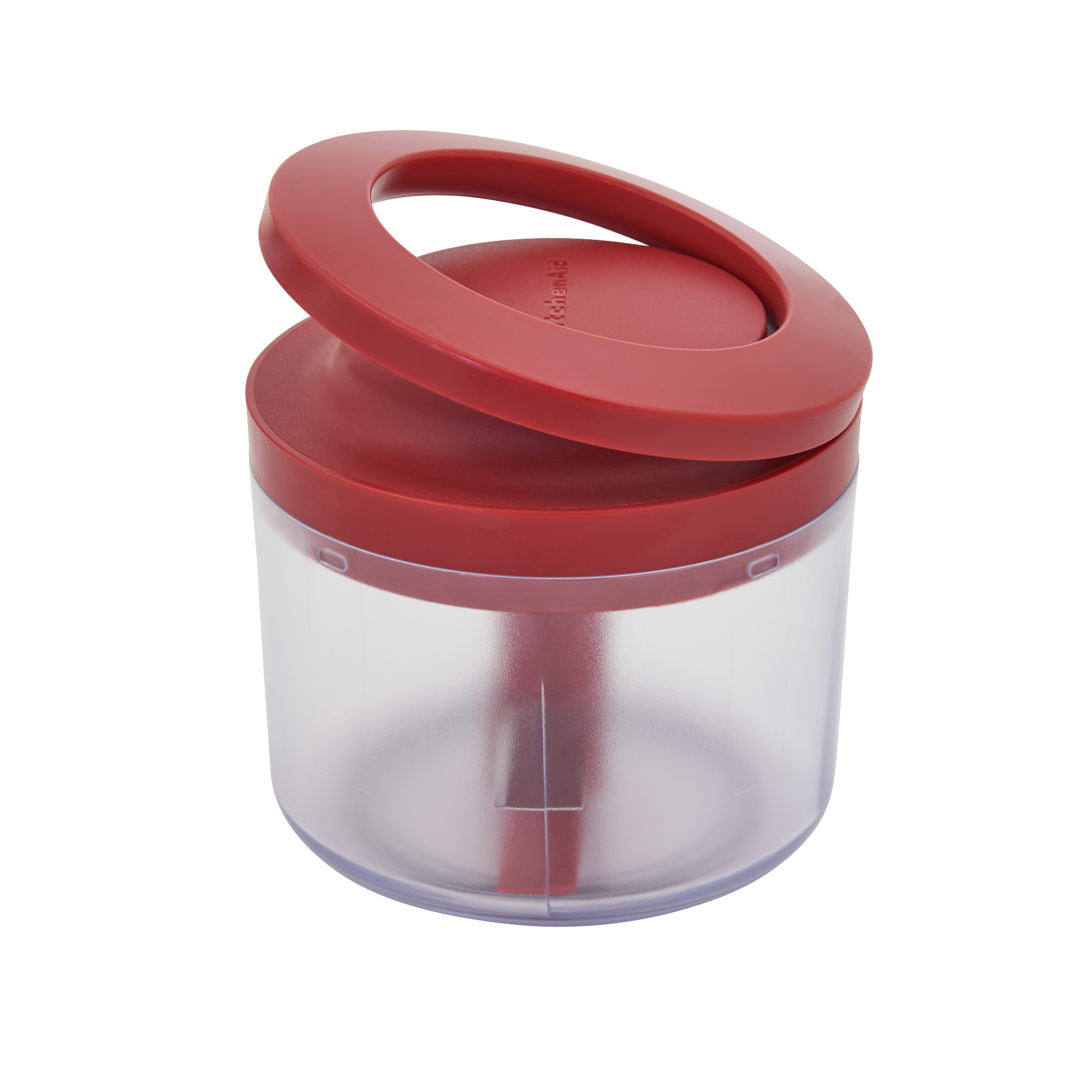 Ein roter Küchenhelfer mit einem transparenten Behälter und einem Griff.
