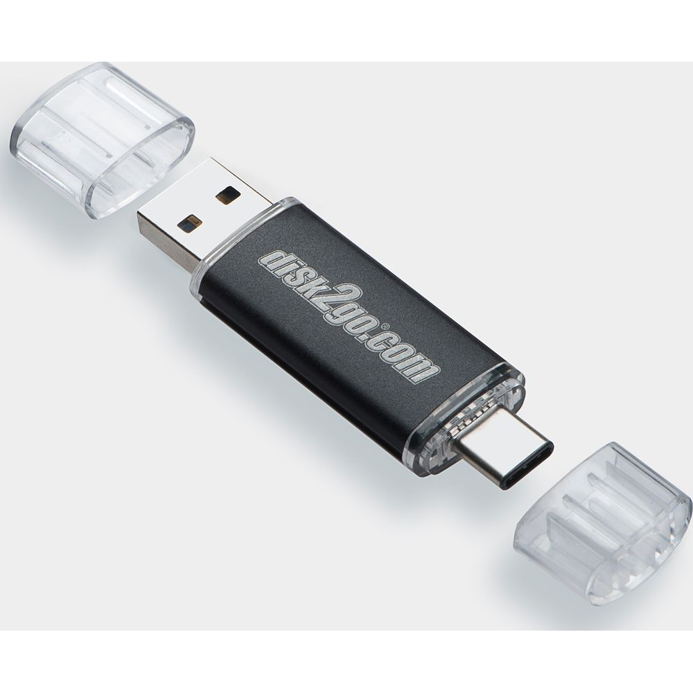 Une clé USB-C avec connecteur USB-A et capuchons de protection.