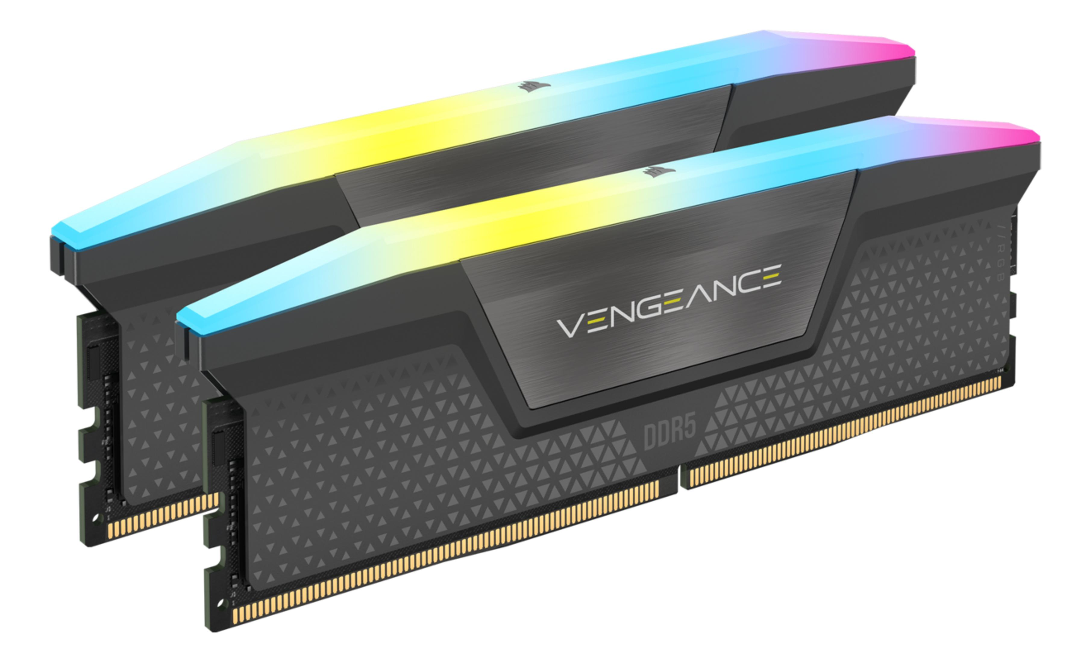 Dwa czarne moduły RAM RGB z napisem "VENGEANCE" i niebiesko-żółto-różowym podświetleniem.