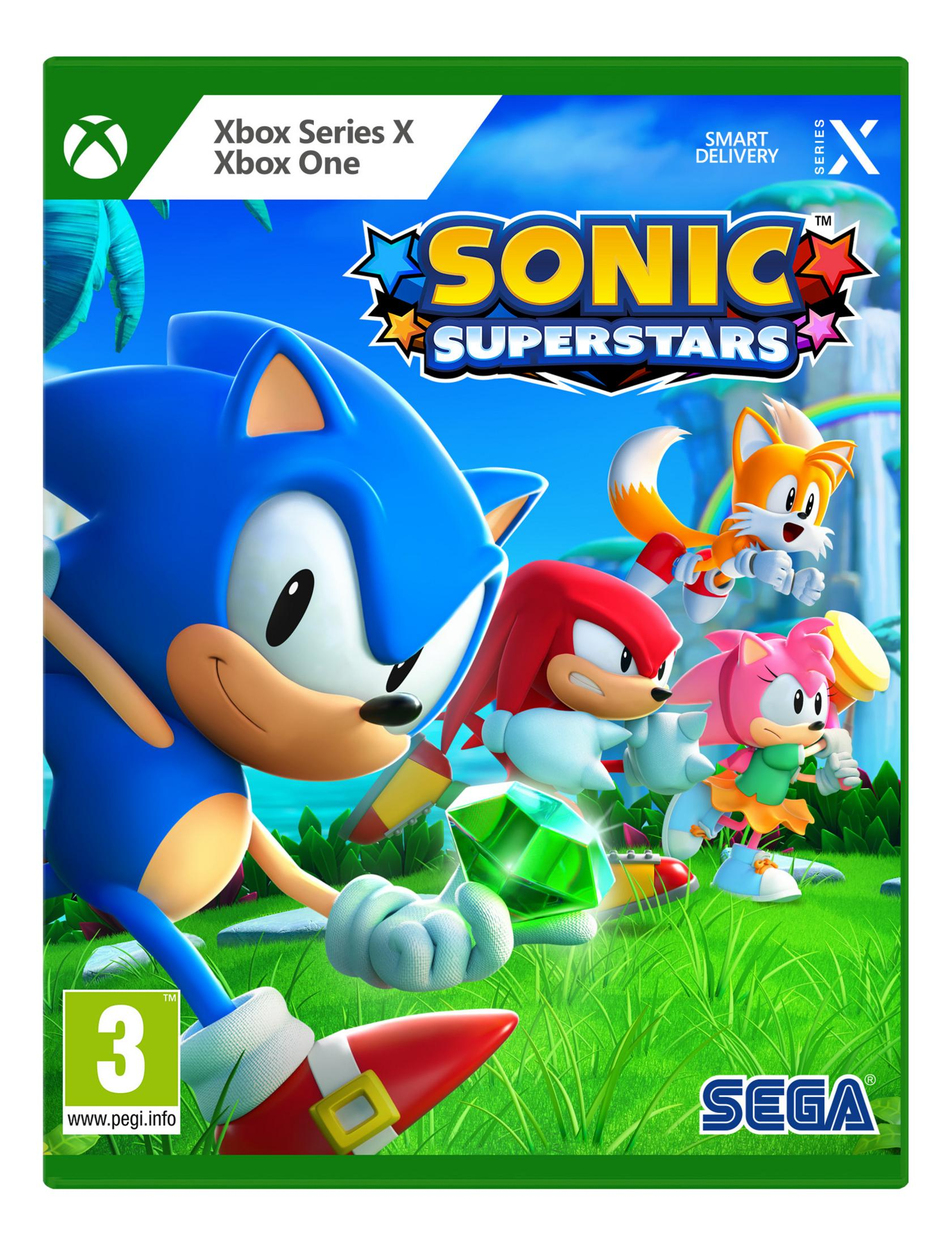Sonic, Tails, Knuckles e Amy corrono sull'erba. Sonic tiene uno smeraldo verde.