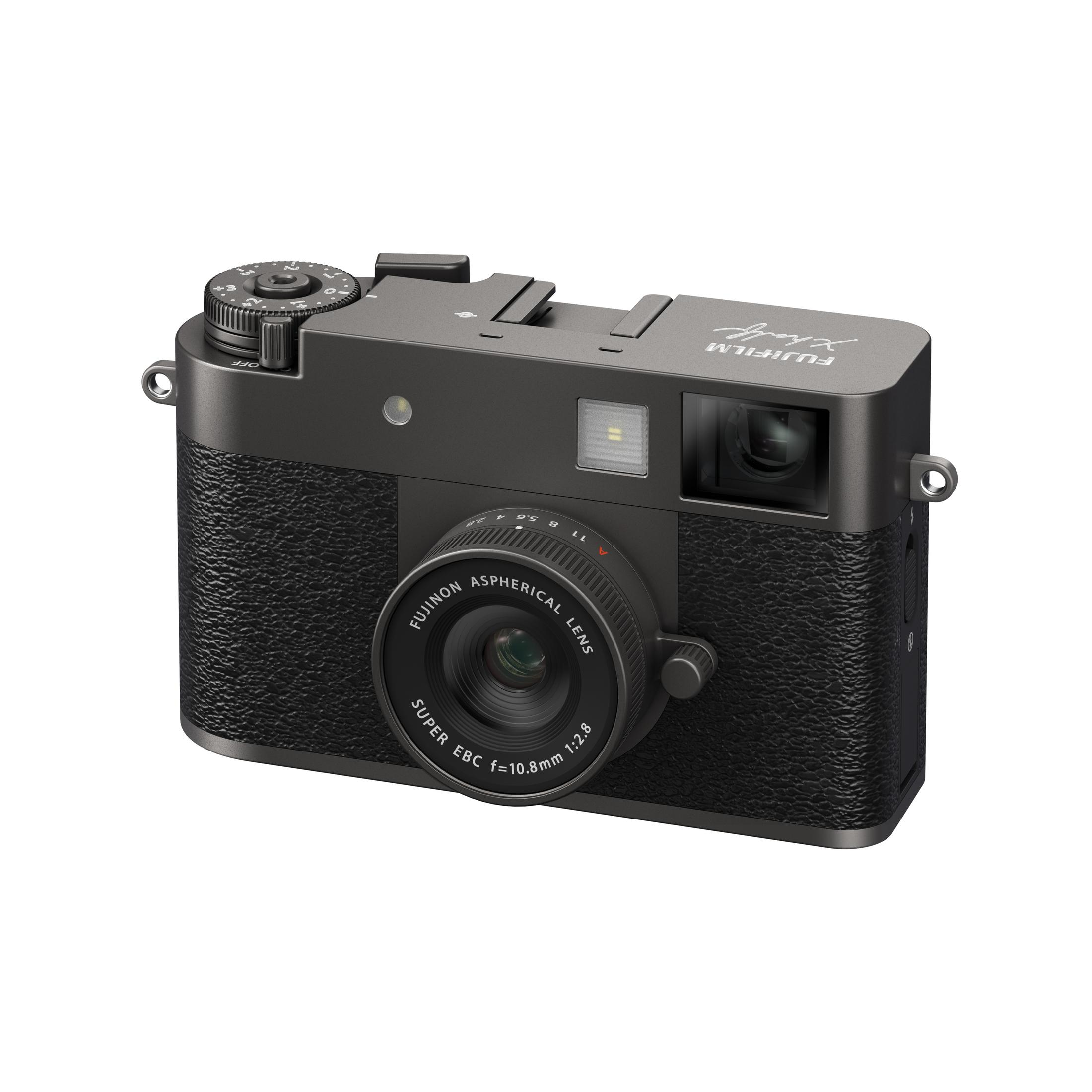 Een grijze Fujifilm camera met lens en instelwielen op witte achtergrond.