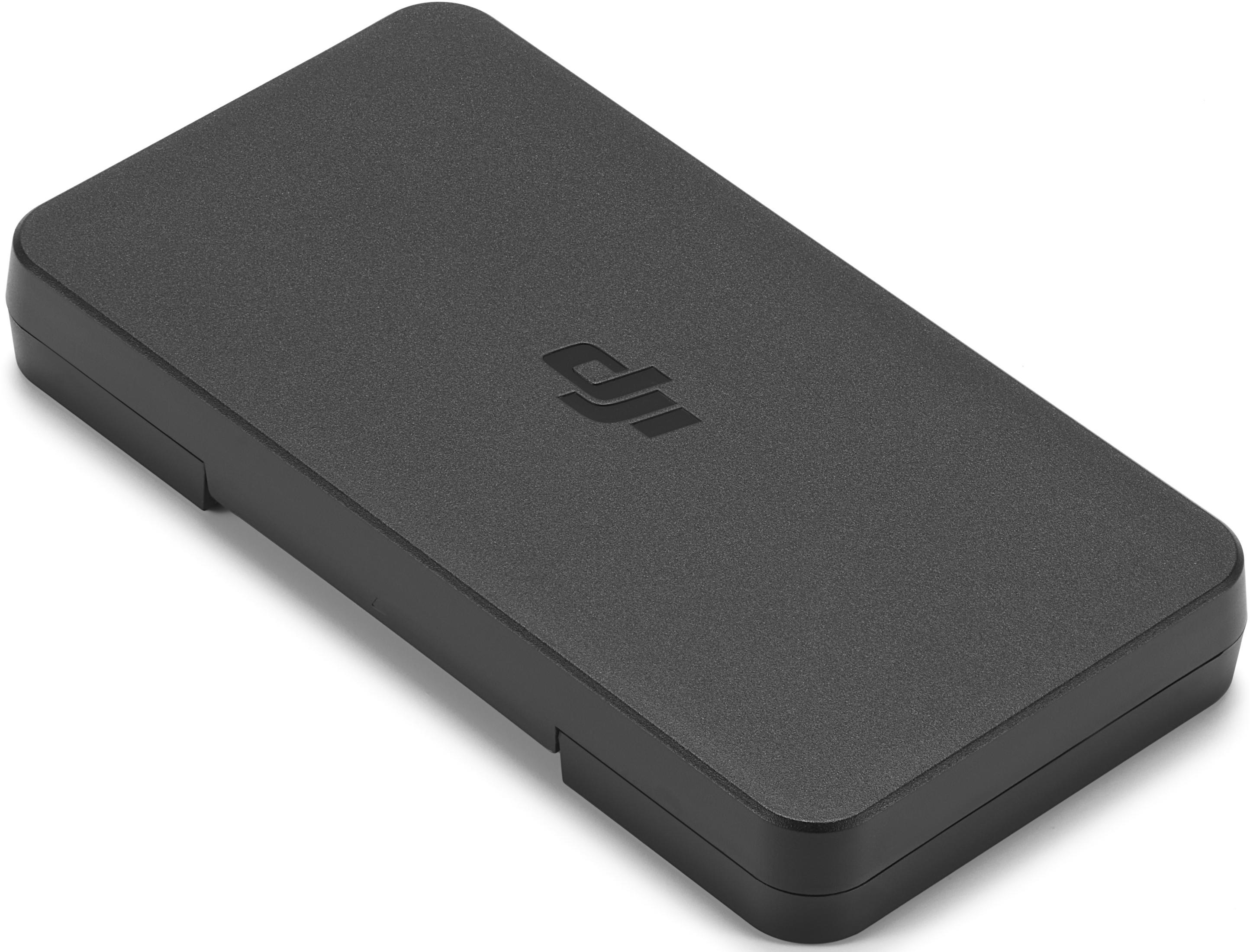 Una caja DJI rectangular negra con esquinas redondeadas.