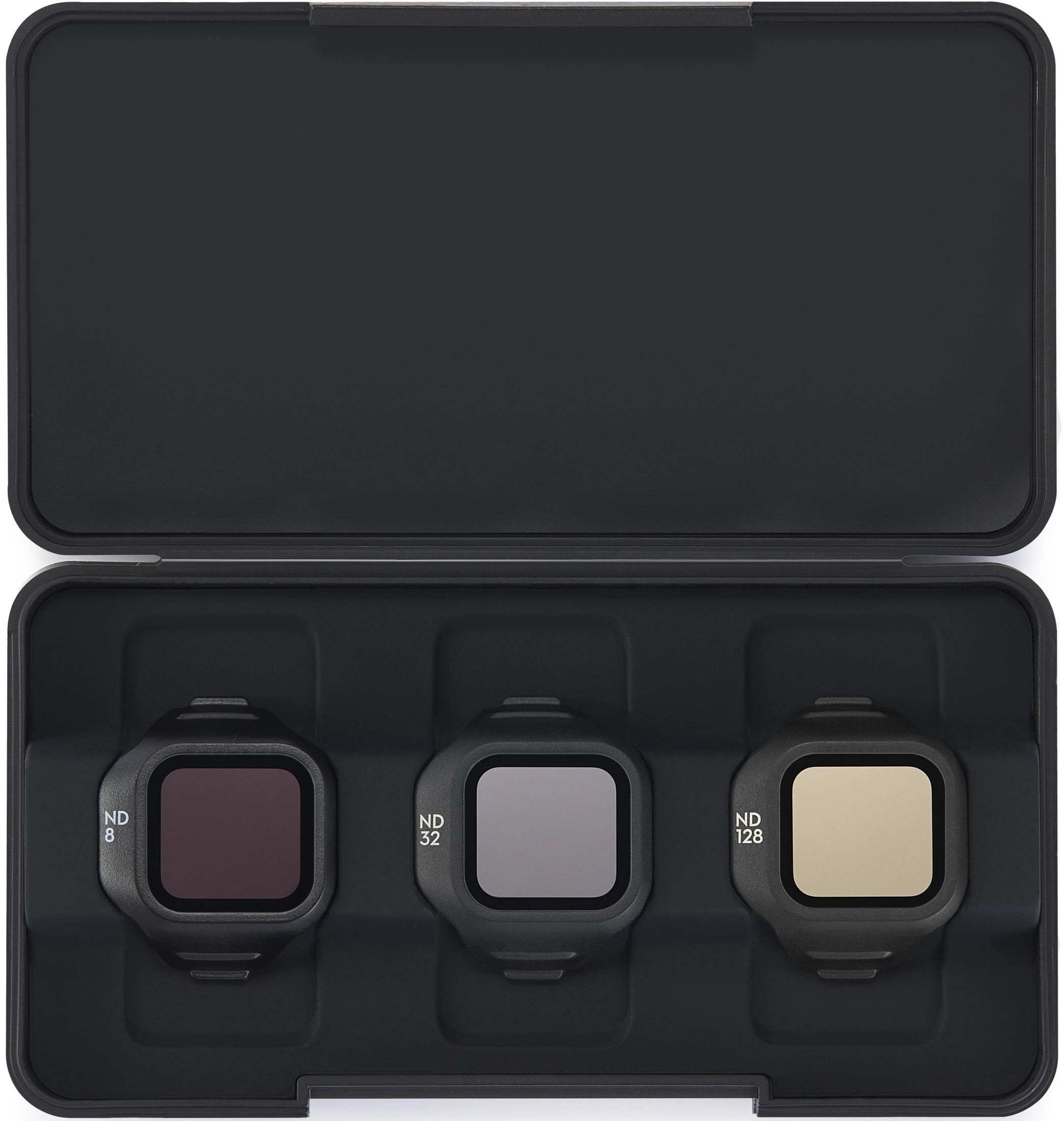 Tres filtros ND grises etiquetados ND 8, ND 32 y ND 128 en un estuche negro.