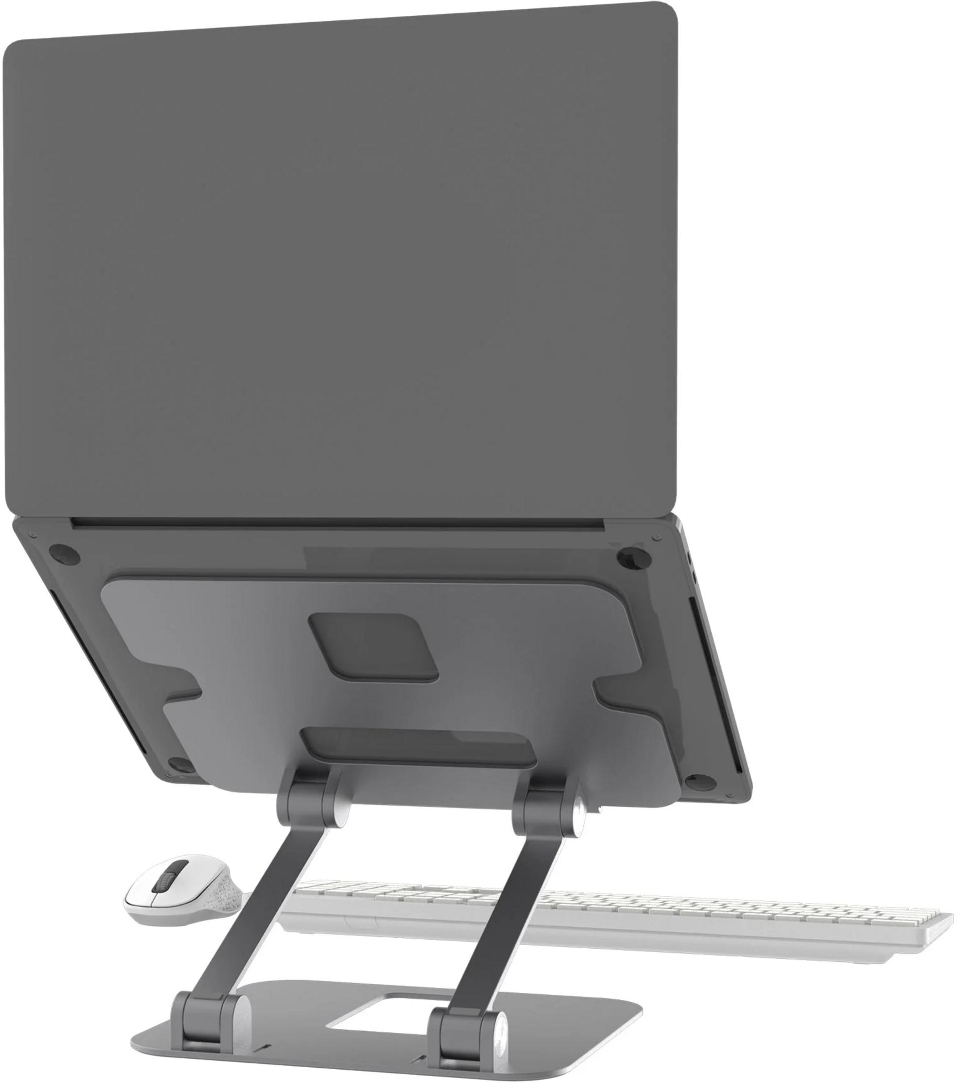 Gray laptop on stand with mouse and keyboard beside it.